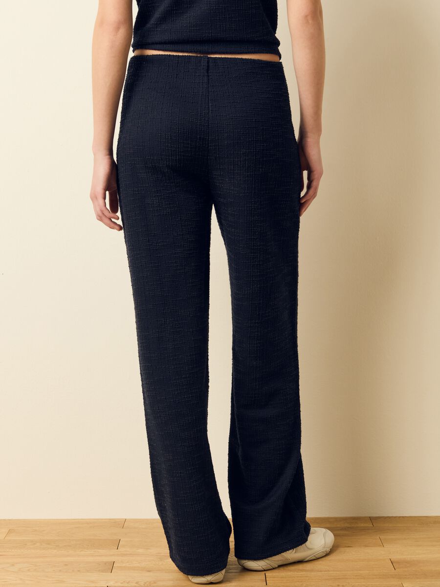 Wide-leg trousers with woven design_2