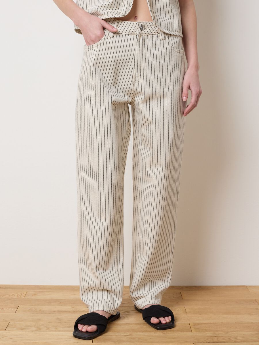 Carrot fit pinstripe jeans._1
