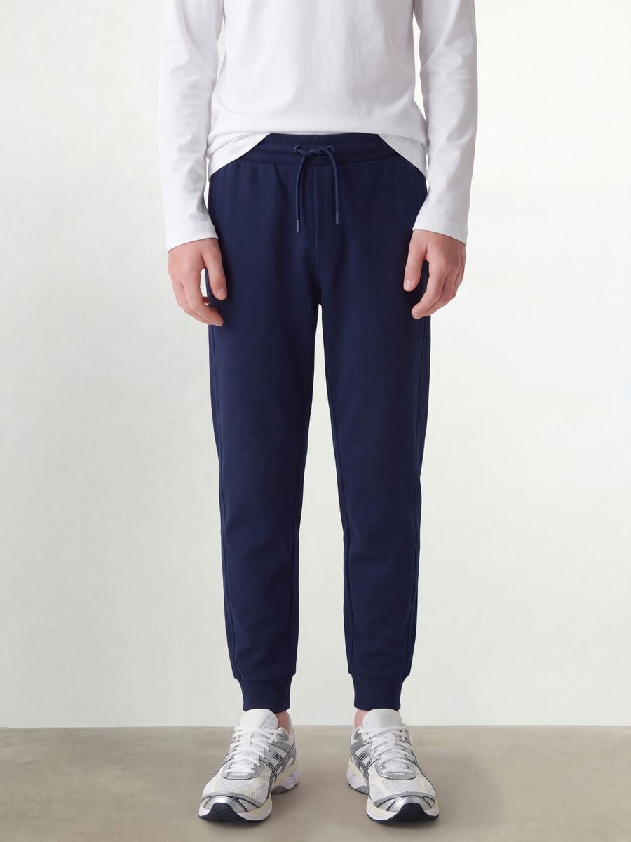 Pantaloni jogger blu in cotone organico_1