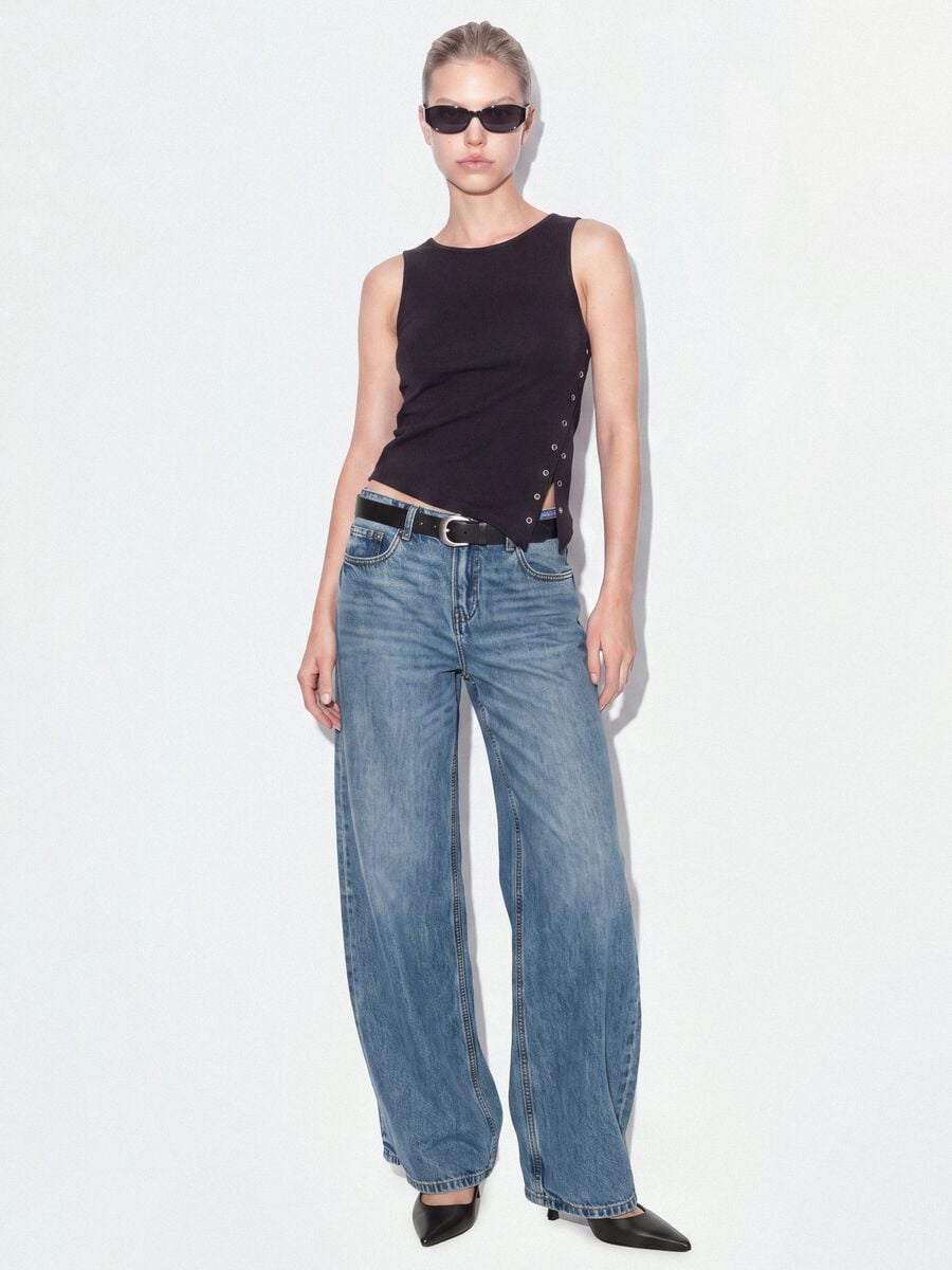 Black stretch cotton top with asymmetric hem and metal eyelets_1