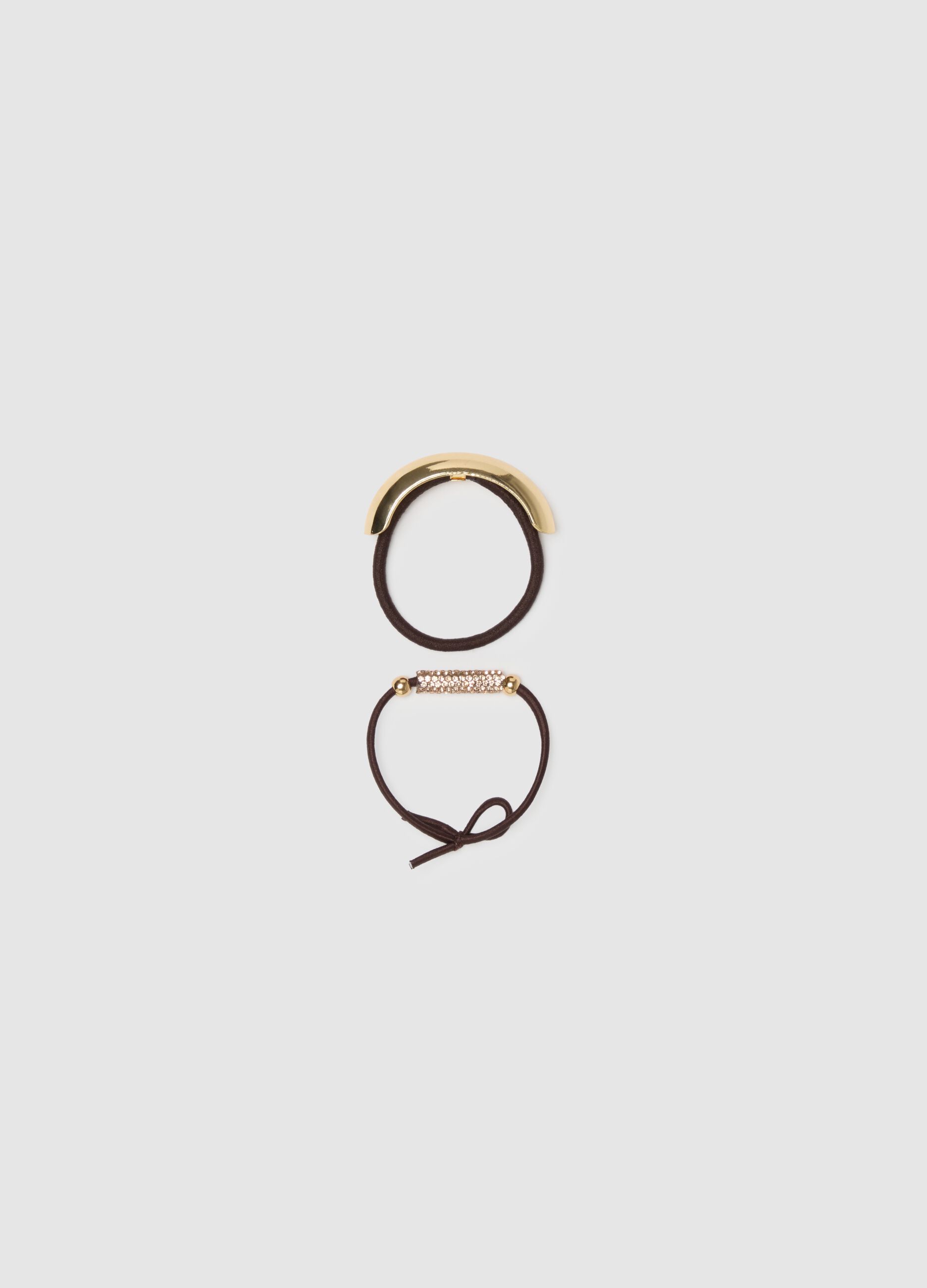 Brown hair accessory with golden elements