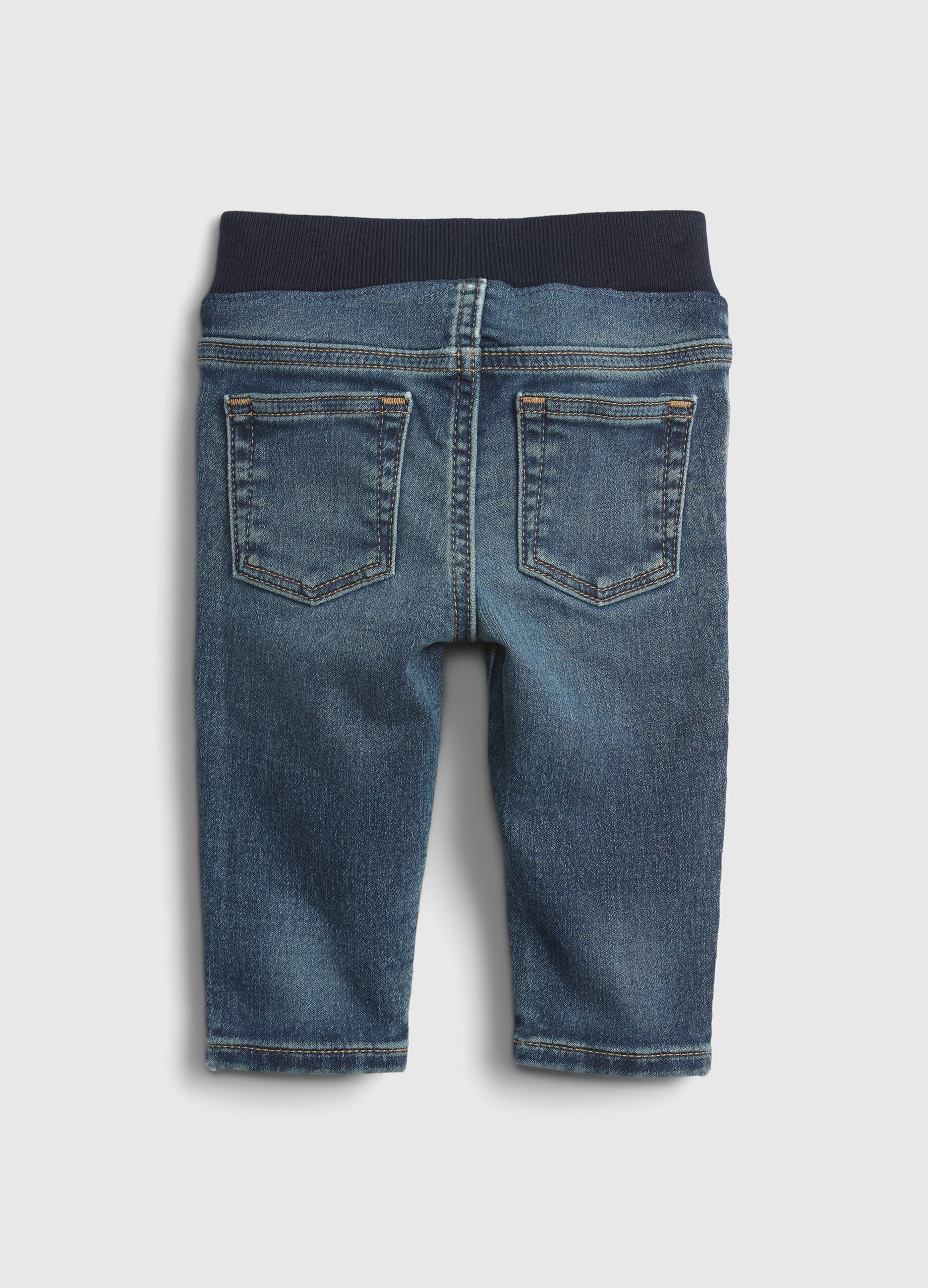 Washed-effect jeans with five pockets