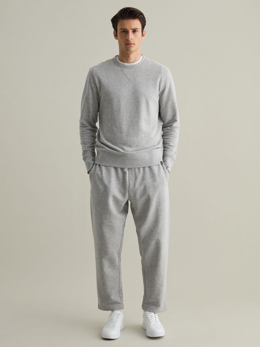 Joggers con coulisse e tasche_0