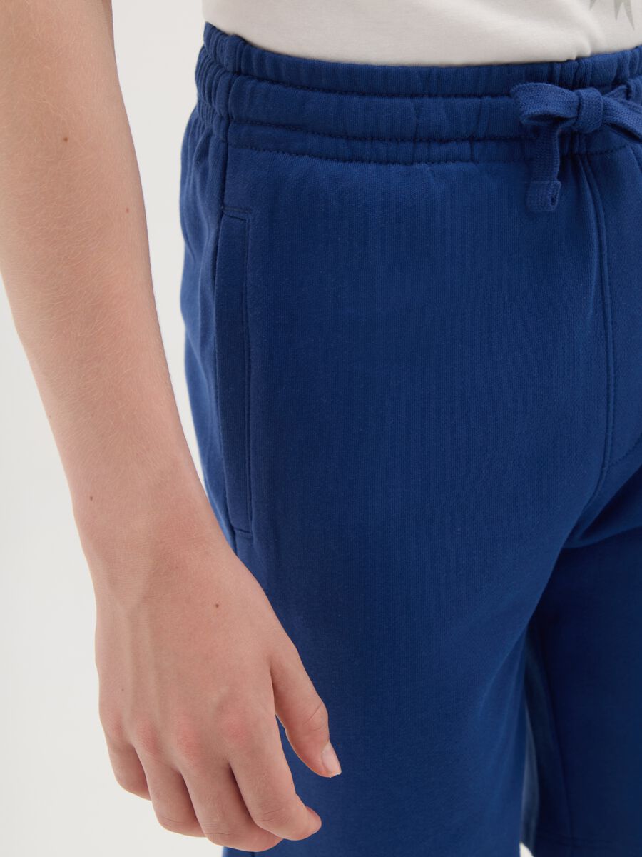Short blue trousers in 100% cotton_1