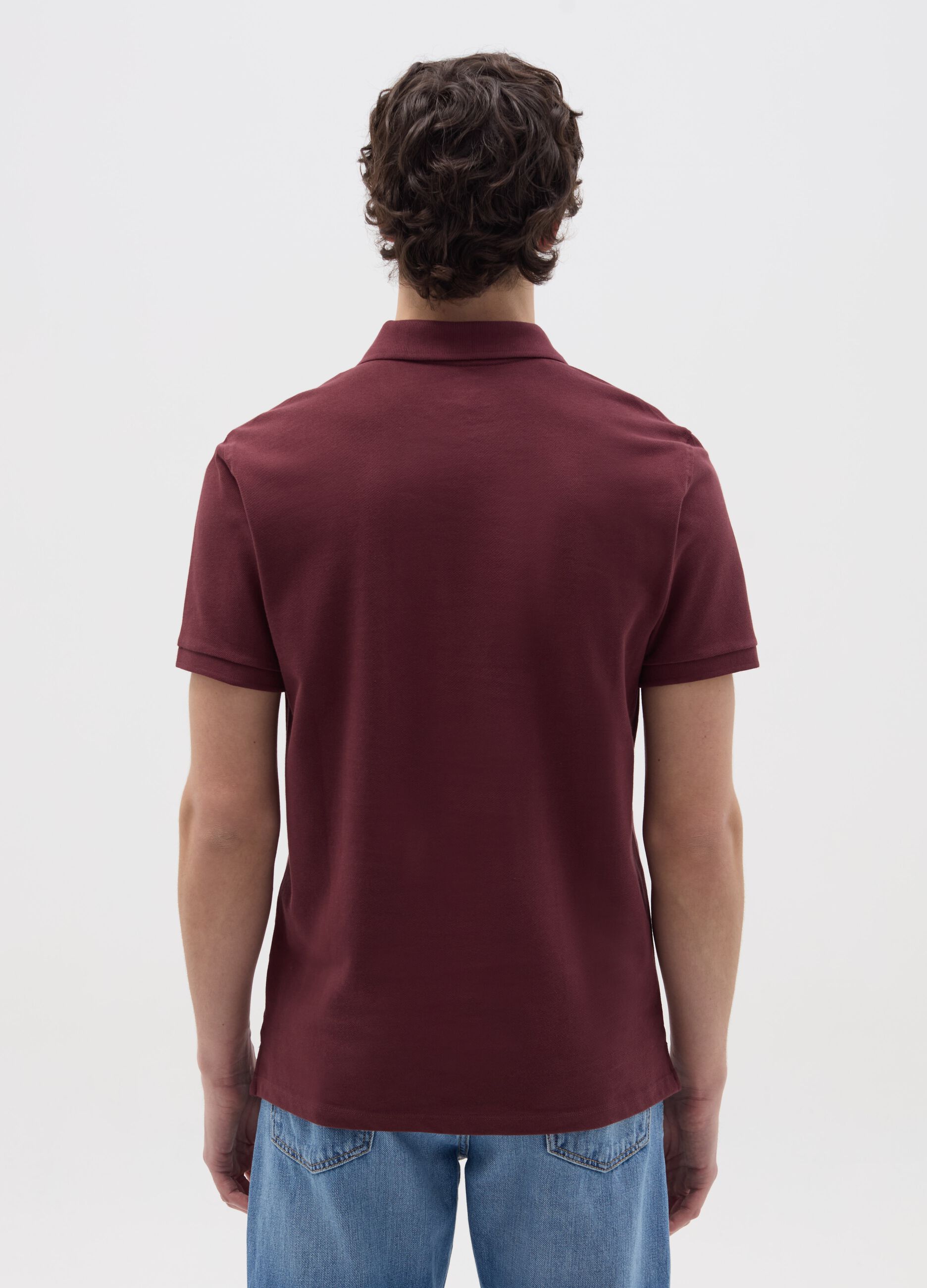 Solid colour polo shirt in organic cotton