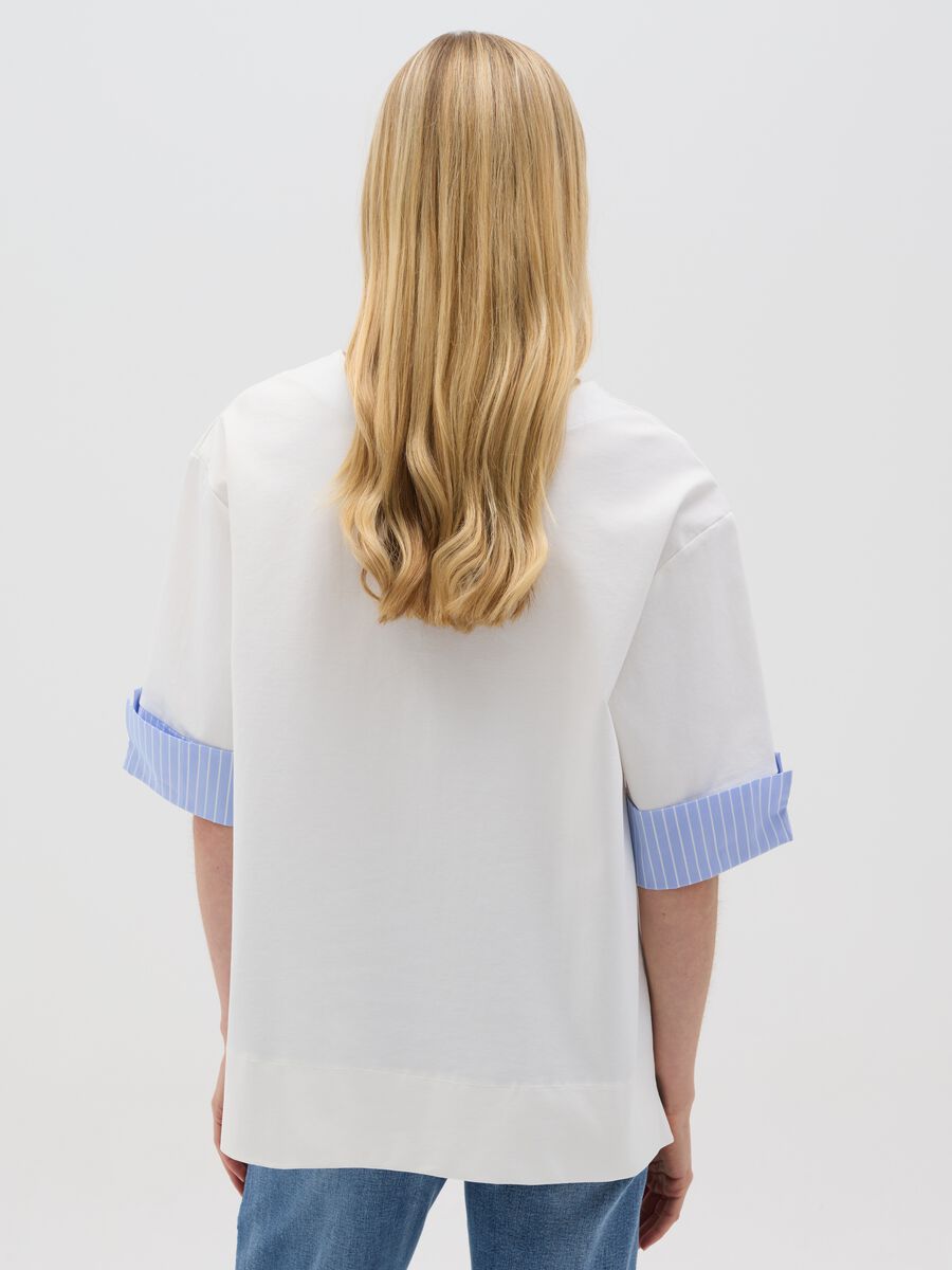 White layered blouse with blue details Hybrid_2