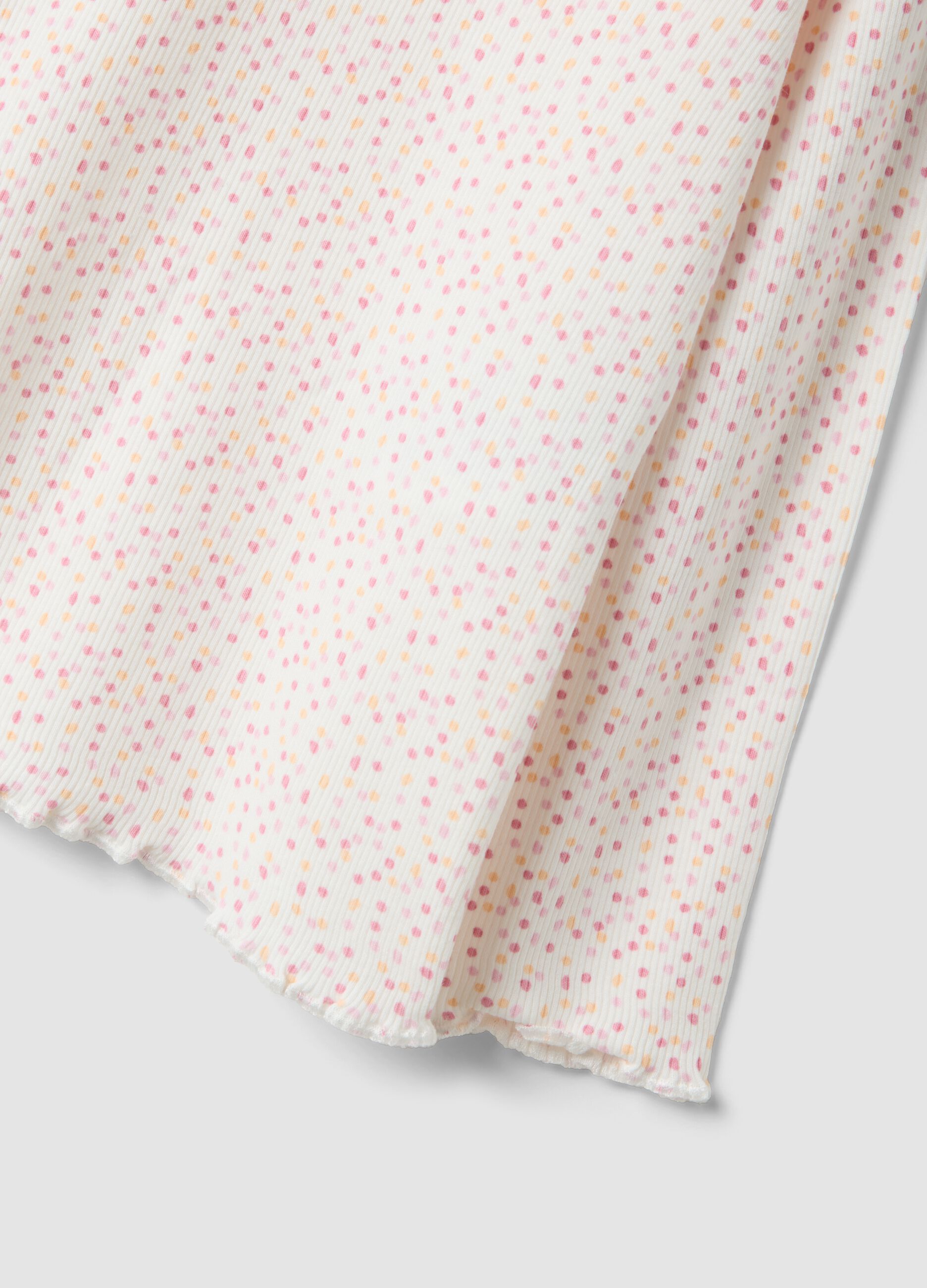 Maglietta bianca in cotone organico elasticizzato a pois slim fit per bimba