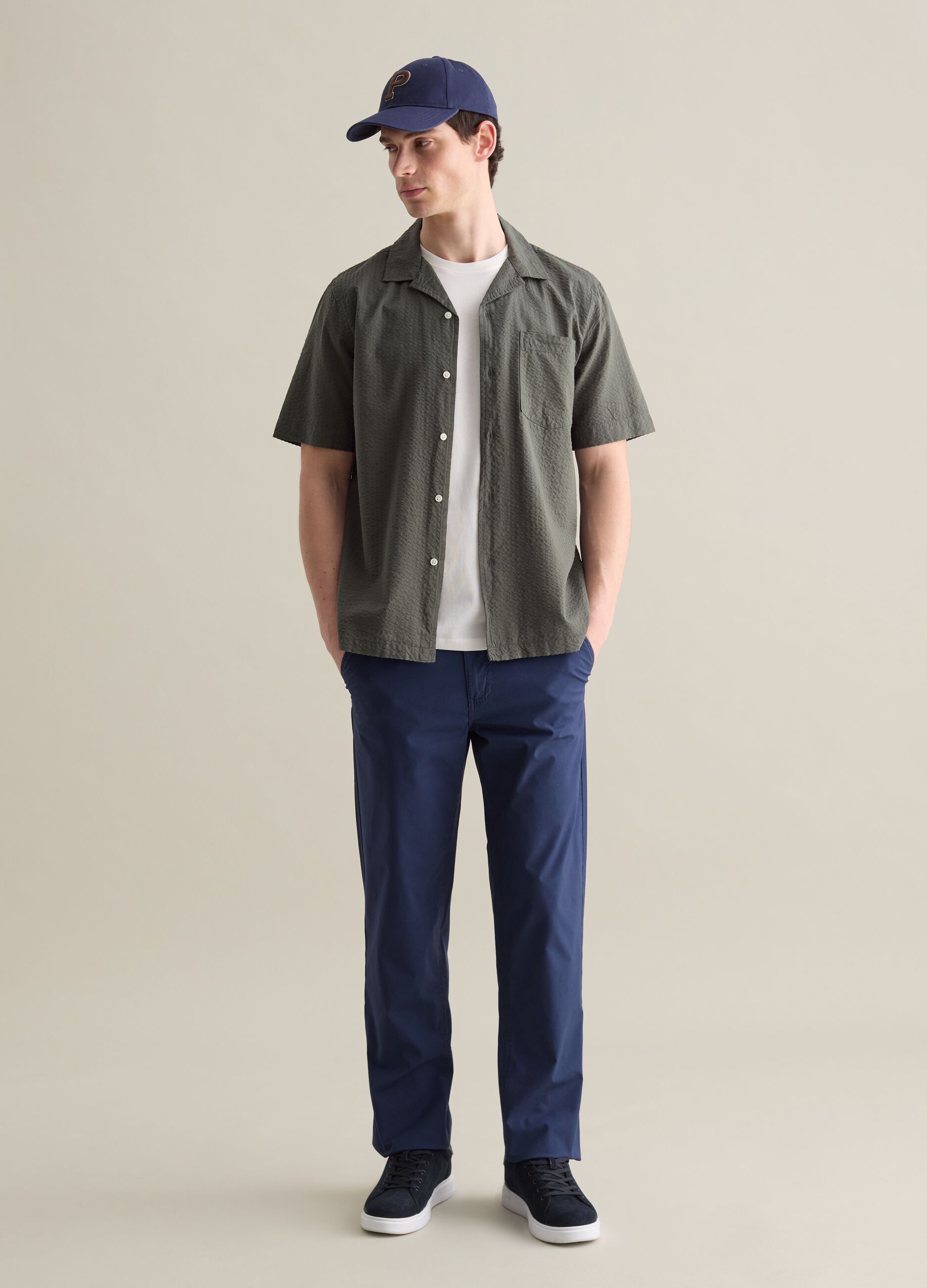 Blue chino trousers in stretch cotton with pockets