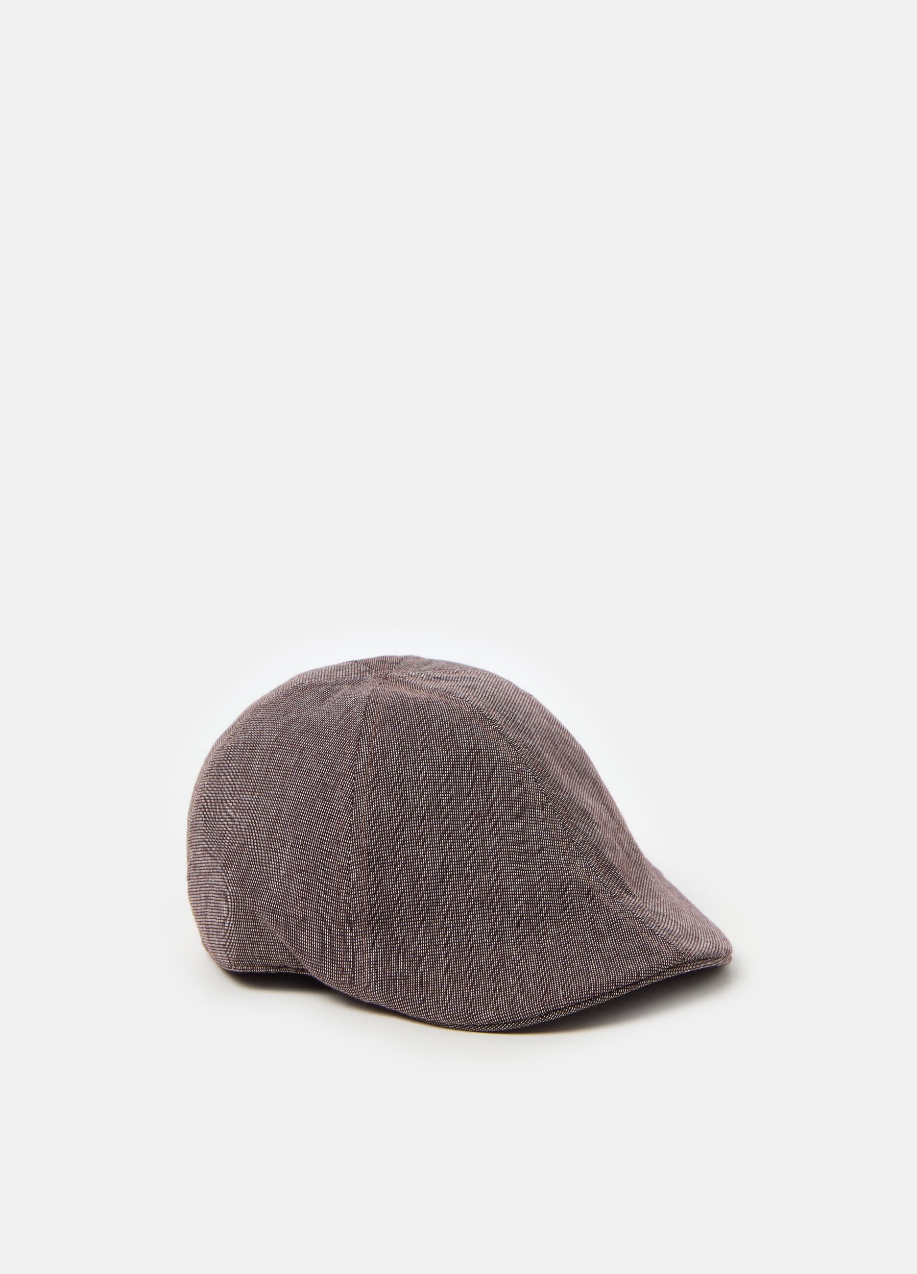 Flat cap in textured fabric