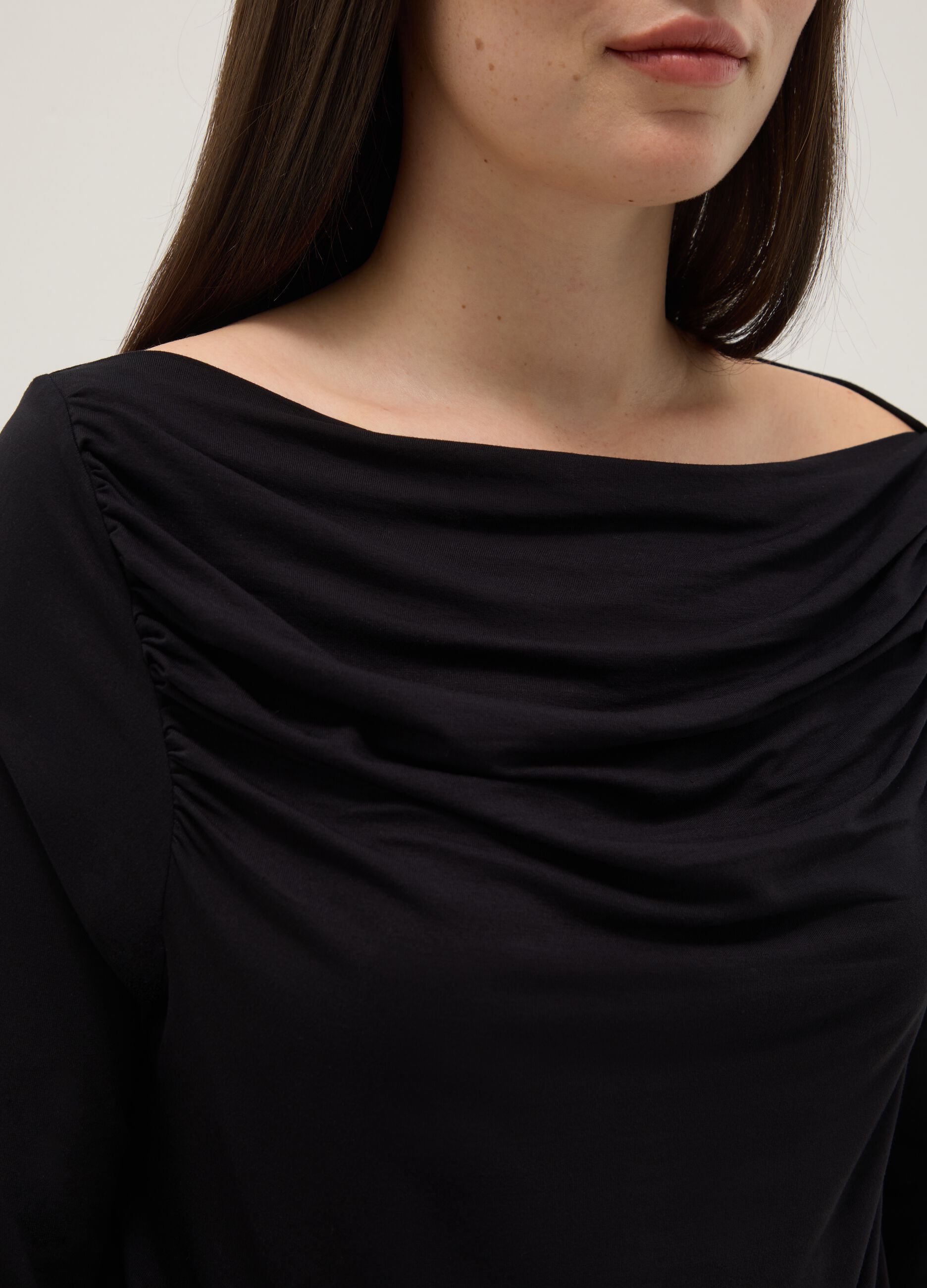 Black stretch viscose long sleeve top with boat neckline and regular fit