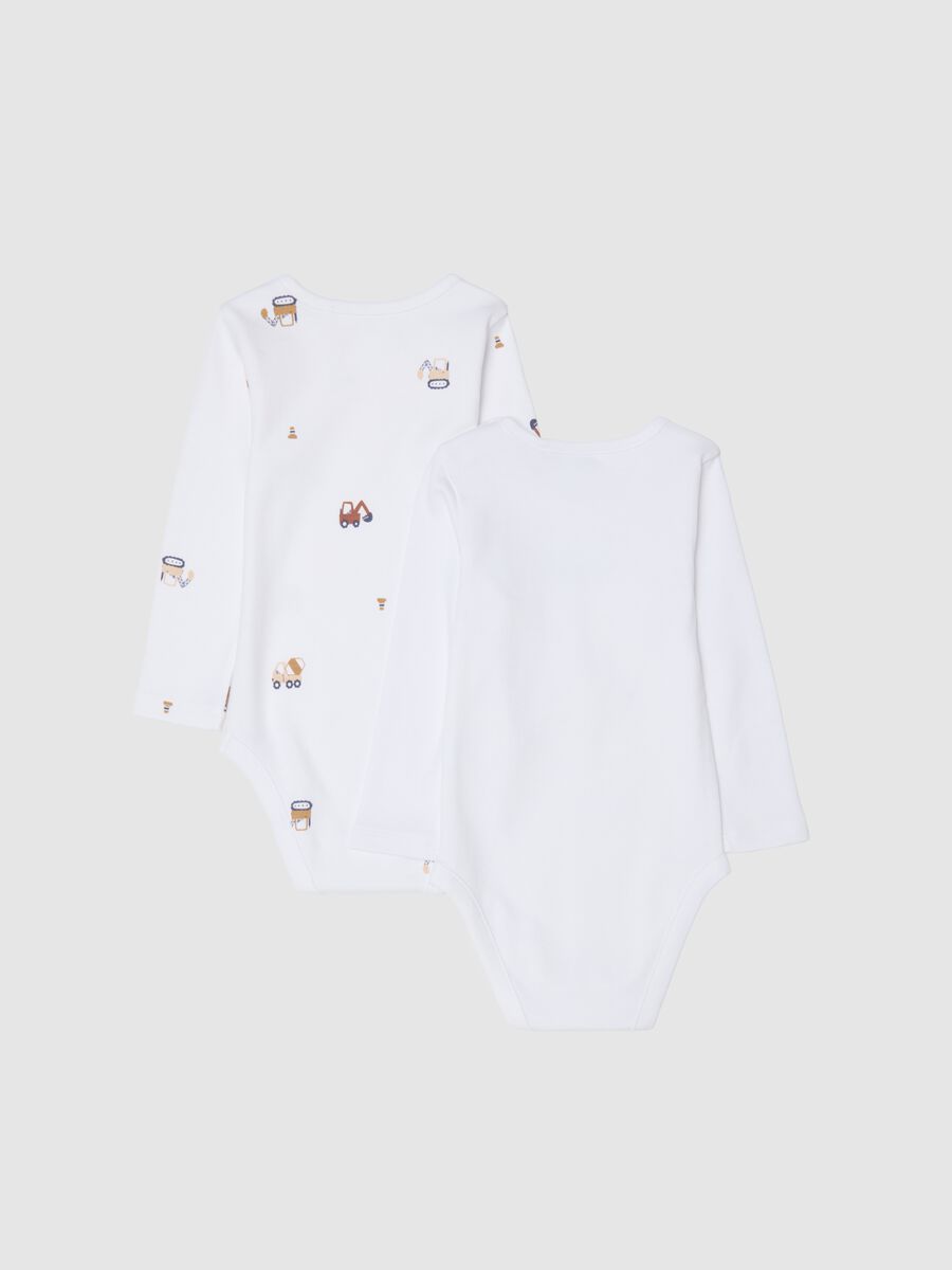 Newborn girl's bi-pack bodysuits in pure white cotton_1