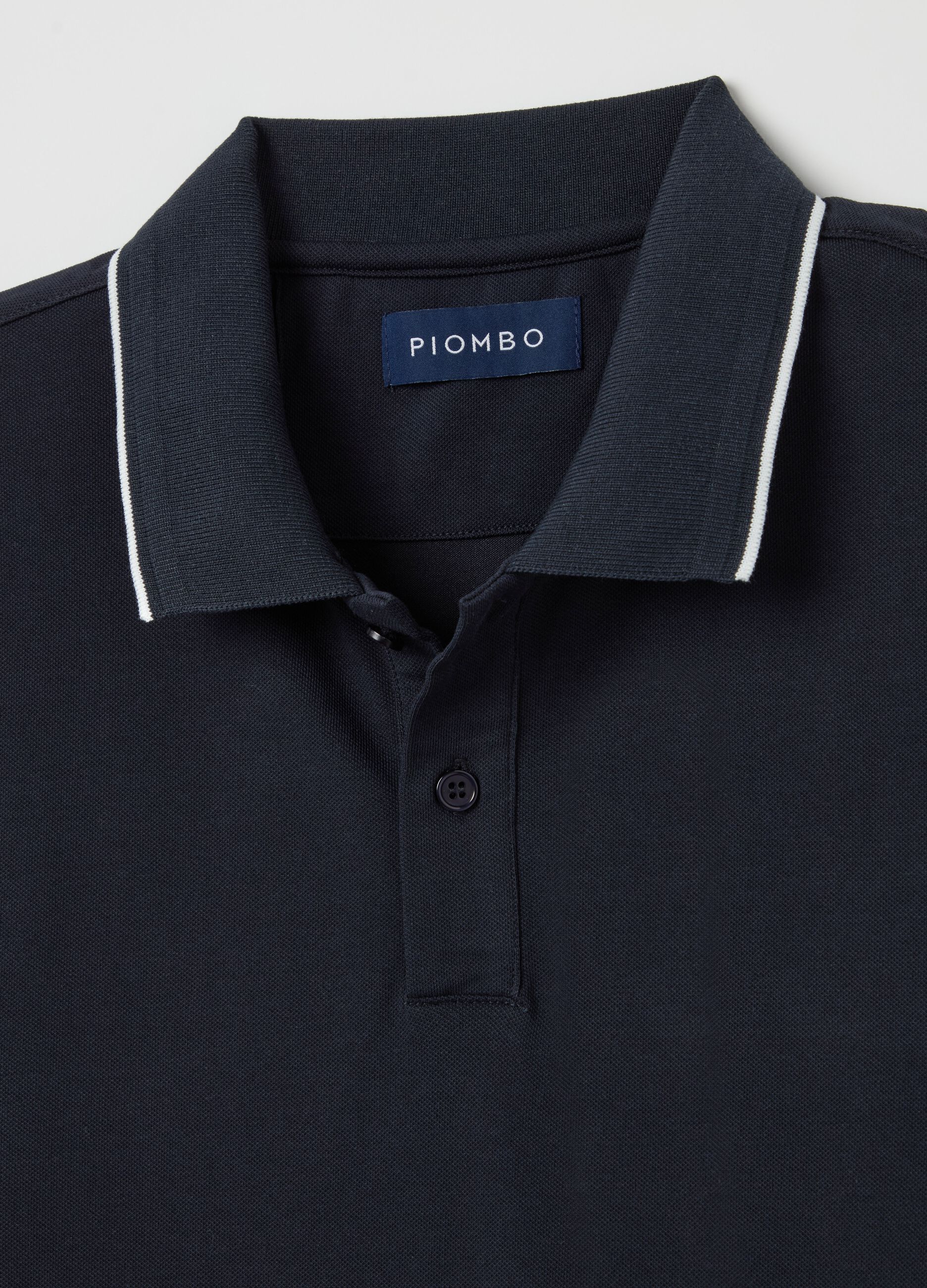 Polo shirt in technical fabric with contrasting edging