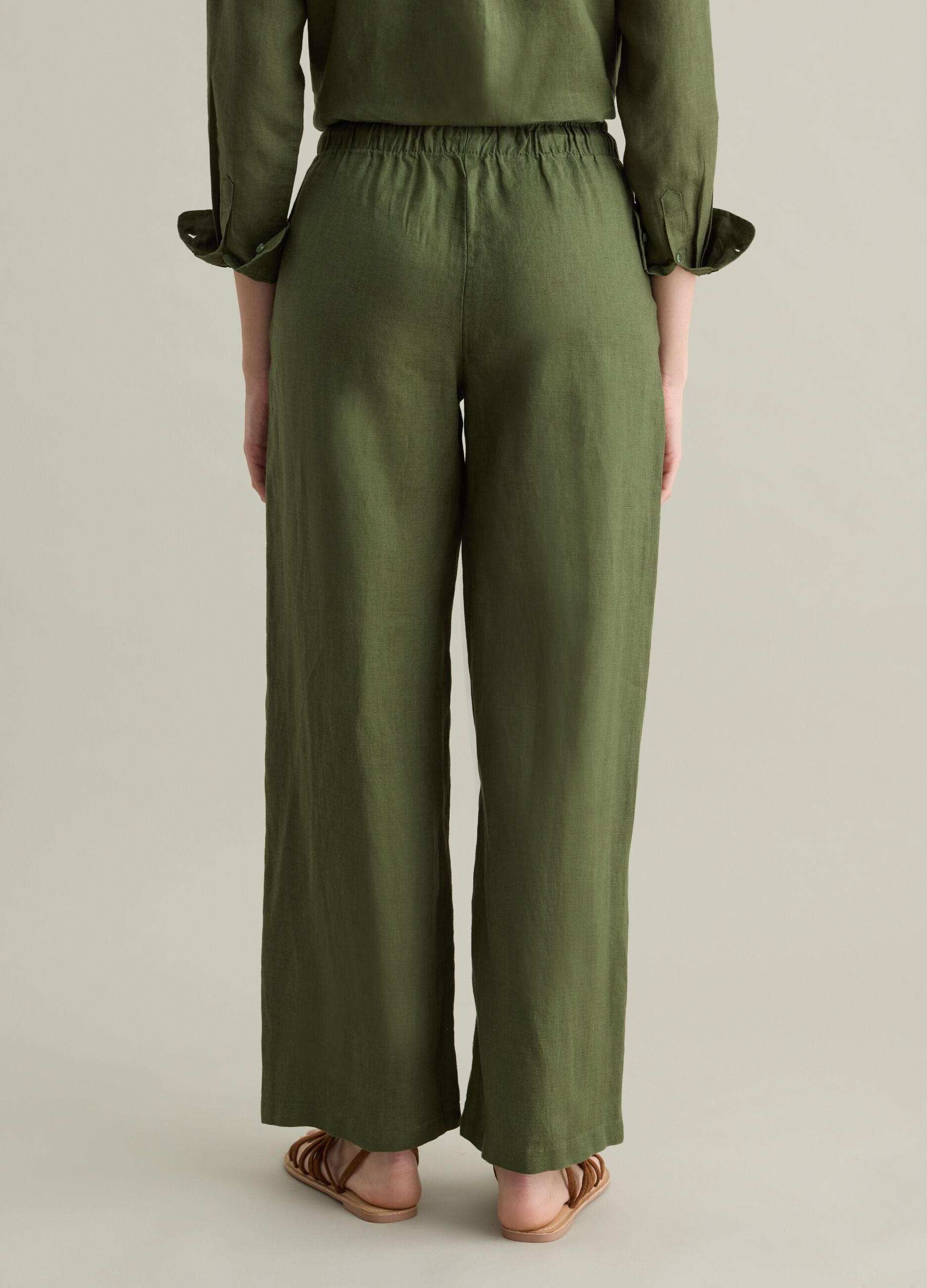 Green wide-leg fluid trousers in linen