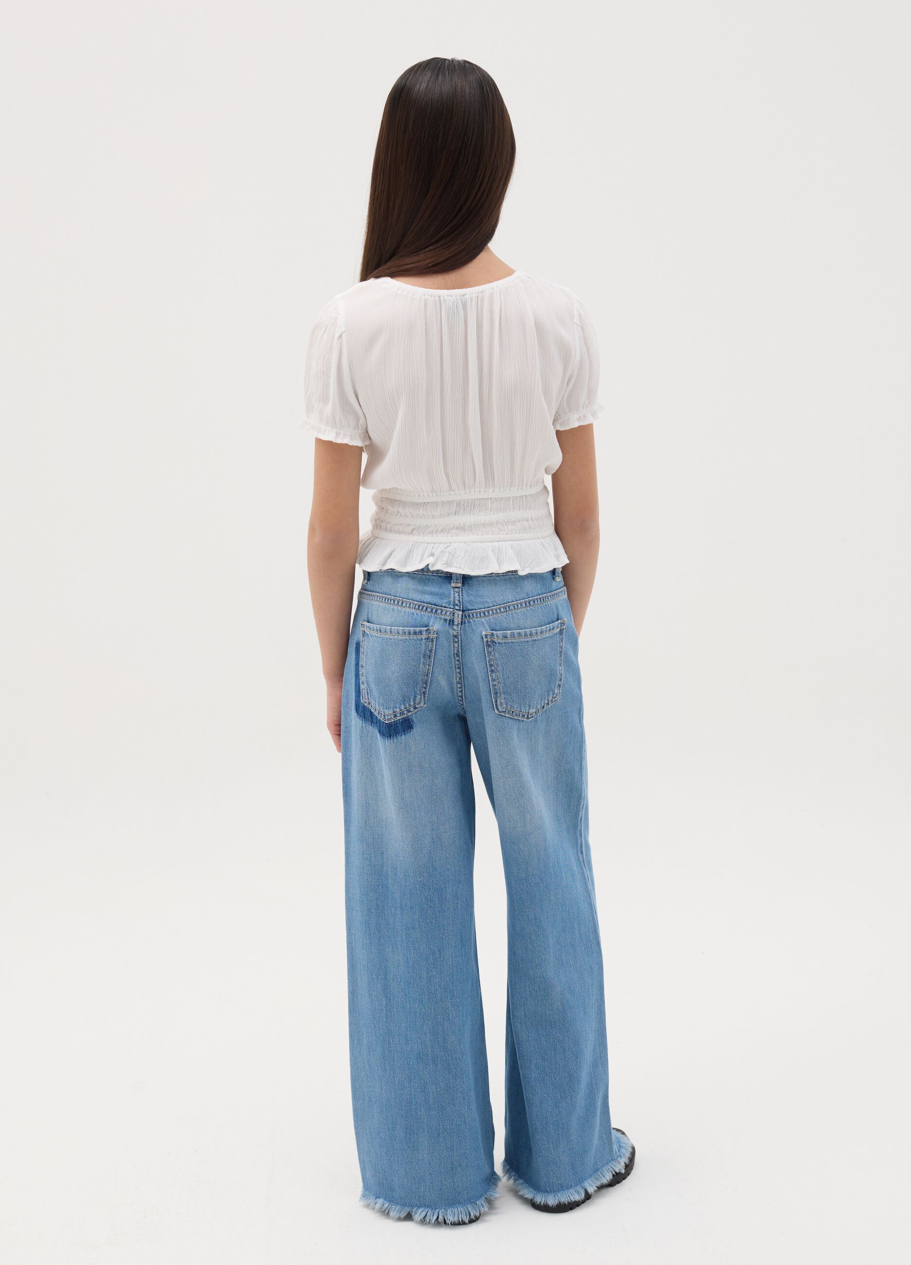 Wide-leg jeans with fringe