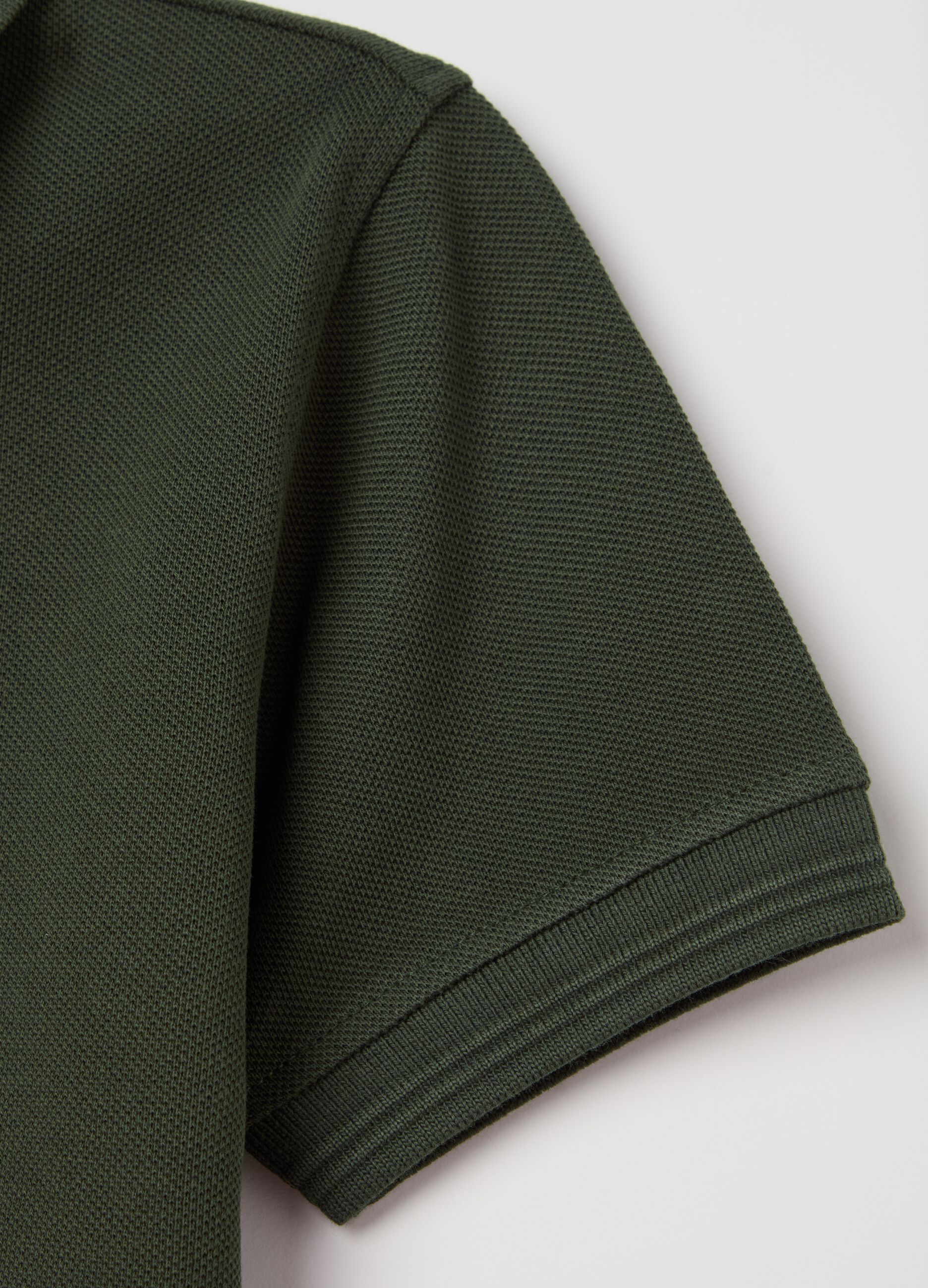 Piquet polo shirt with patch and "Going to Discover" print