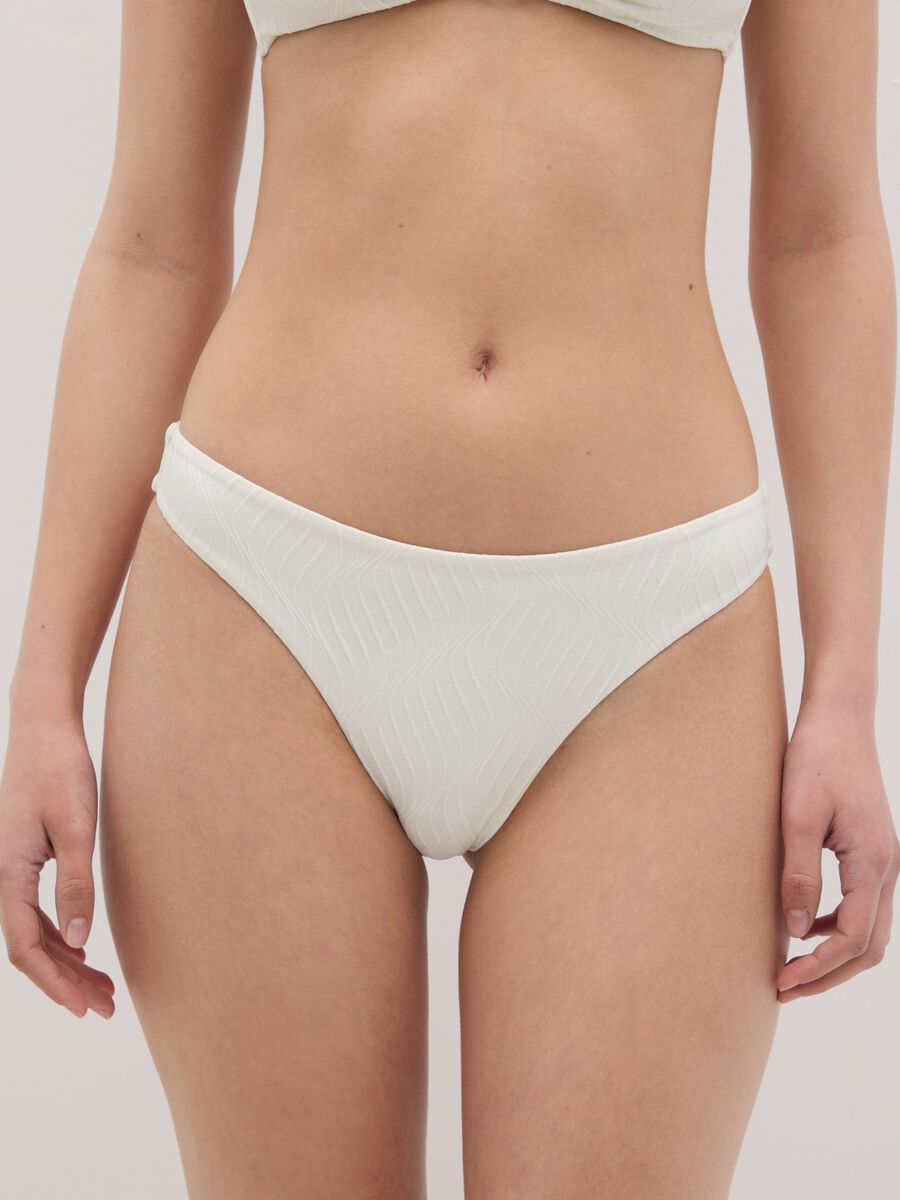 Women’s Brazilian-cut briefs in white stretch fabric_1
