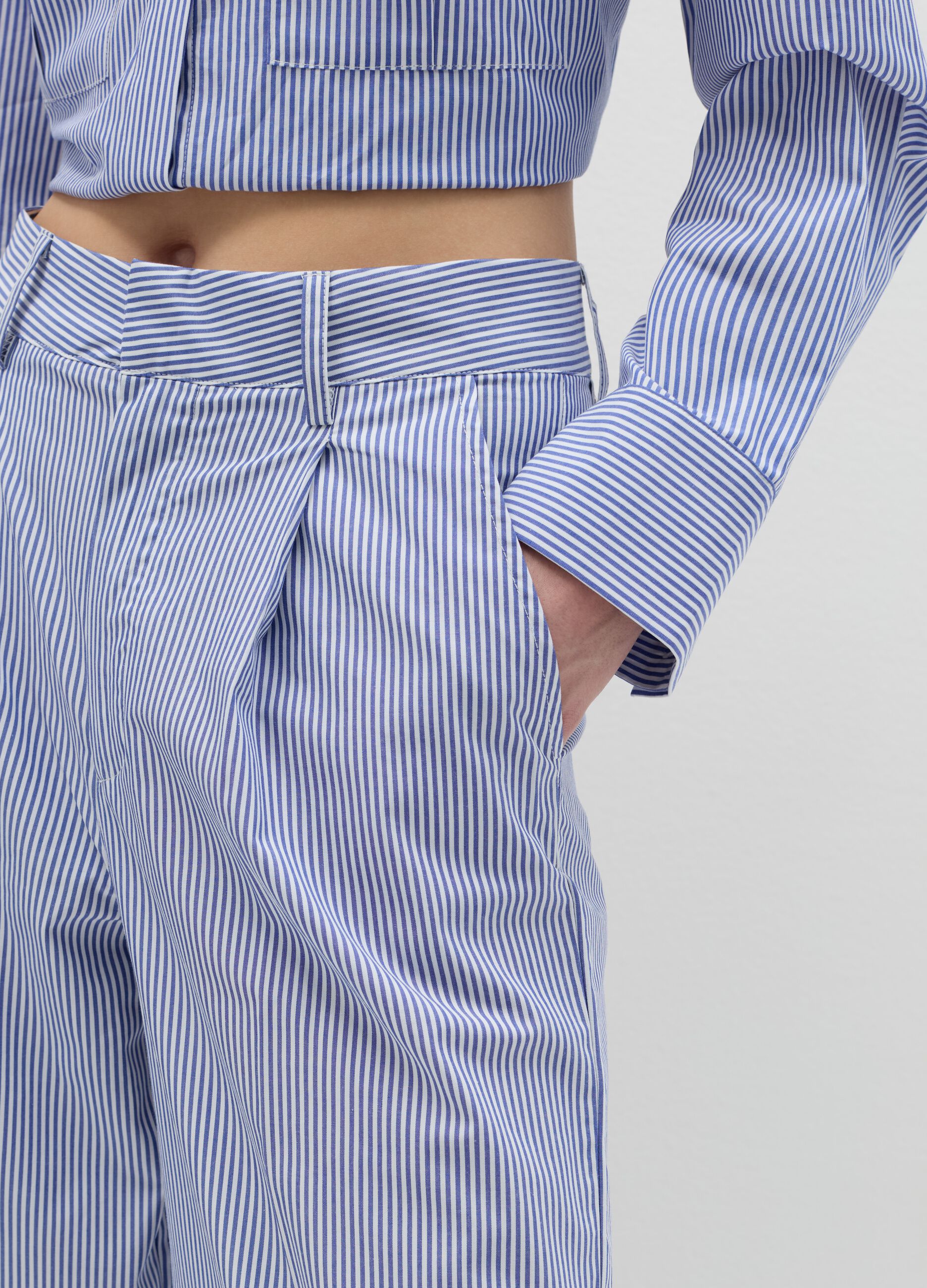Tailored trousers with thin stripes
