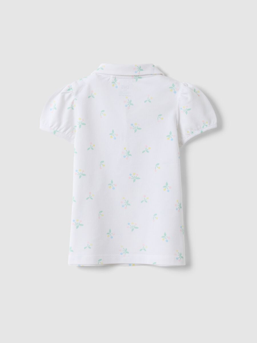 Girls' white cotton polo regular fit with floral pattern_1