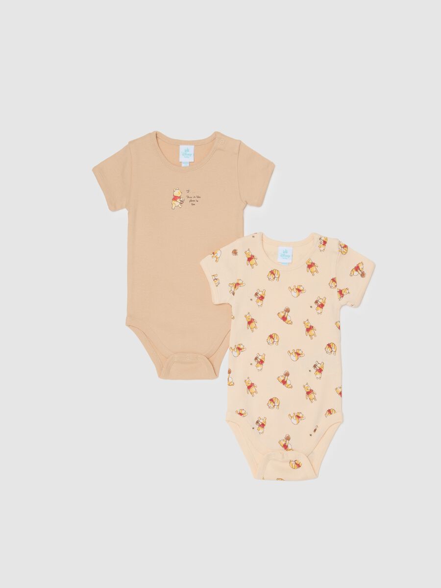 Unisex baby bodysuit in pure beige cotton with Winnie the Pooh print_0