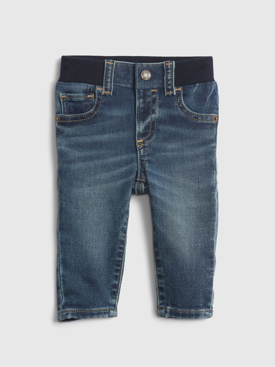 Washed-effect jeans with five pockets_0