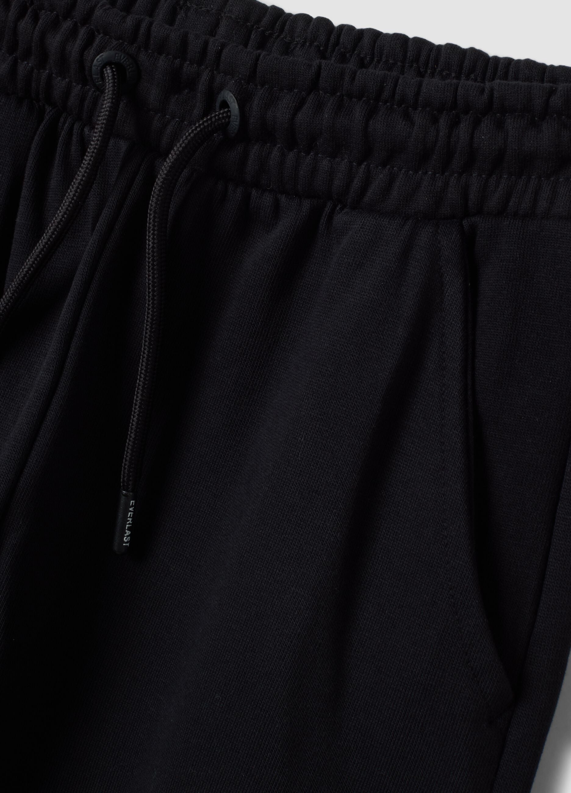 Black pure cotton cargo jogger trousers with appliqu&eacute; for boys