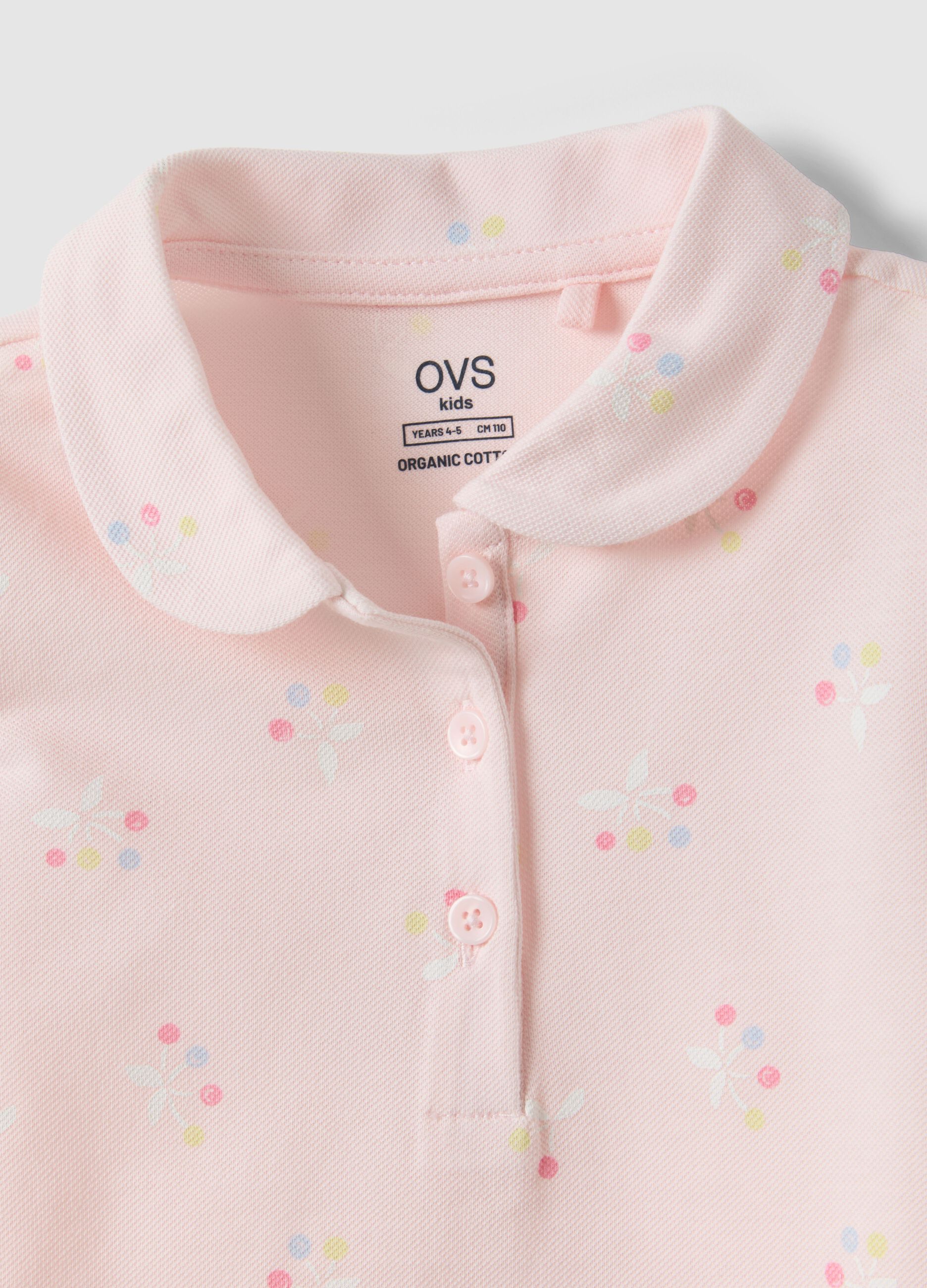 Girls' pure cotton pink polo with floral pattern, regular fit