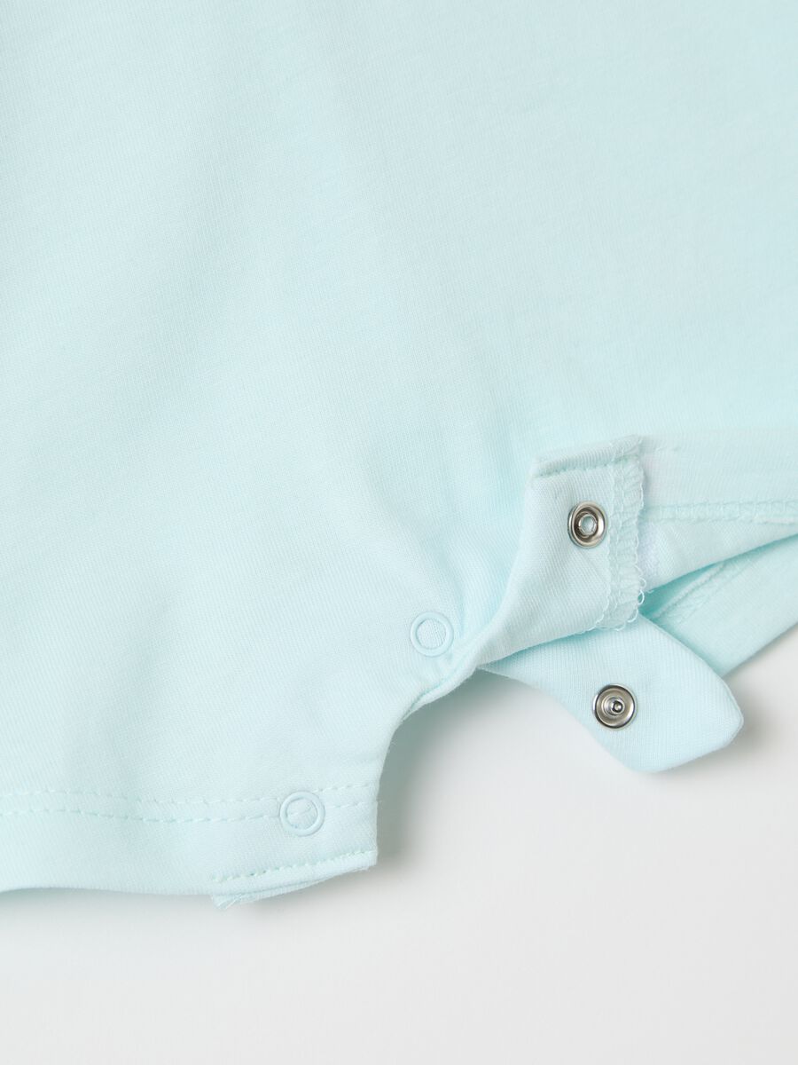White and light blue romper suit in cotton with print_3