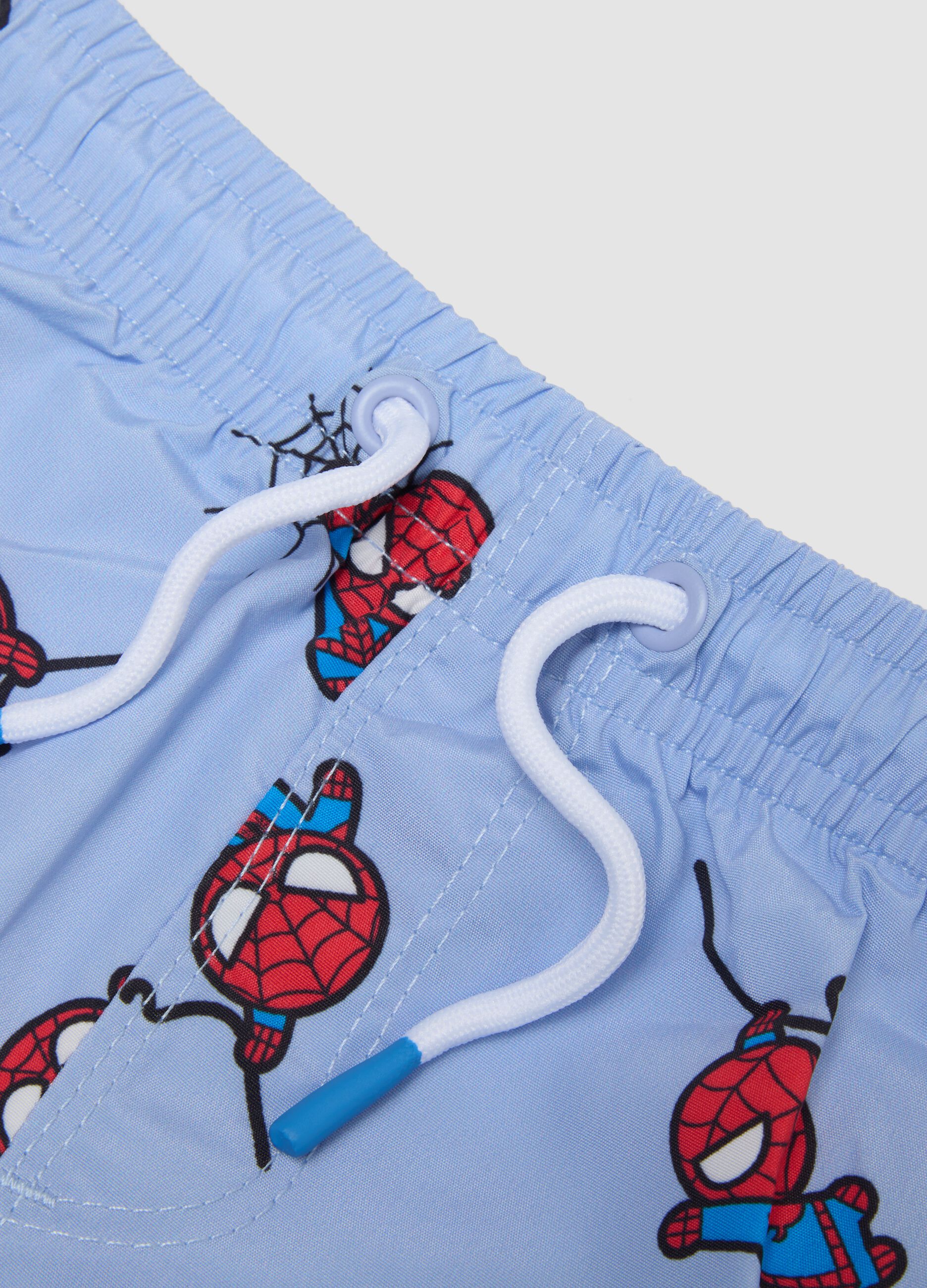 Blue swim shorts with Spidey print