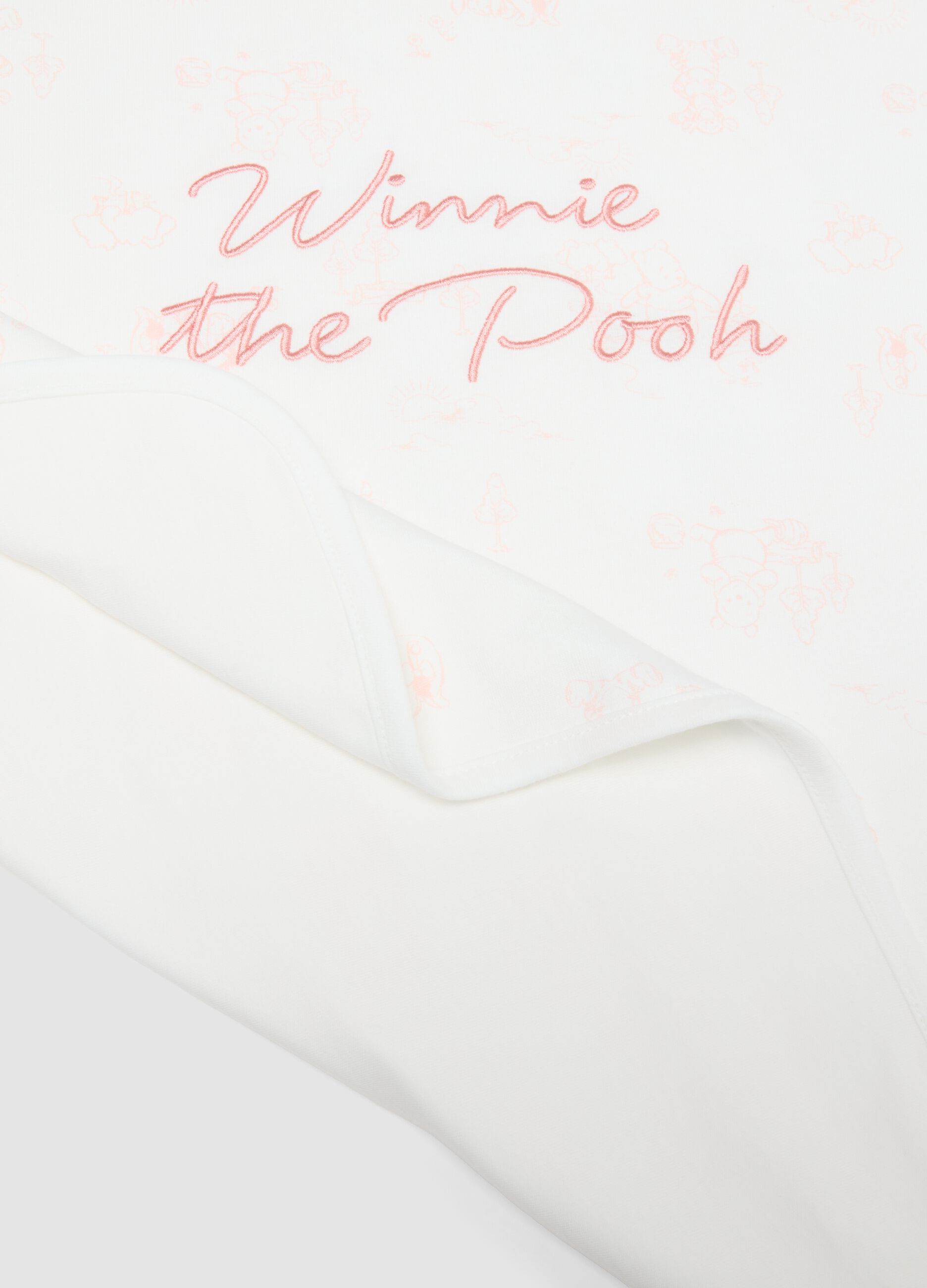 White organic cotton baby girl blanket with Winnie-the-Pooh