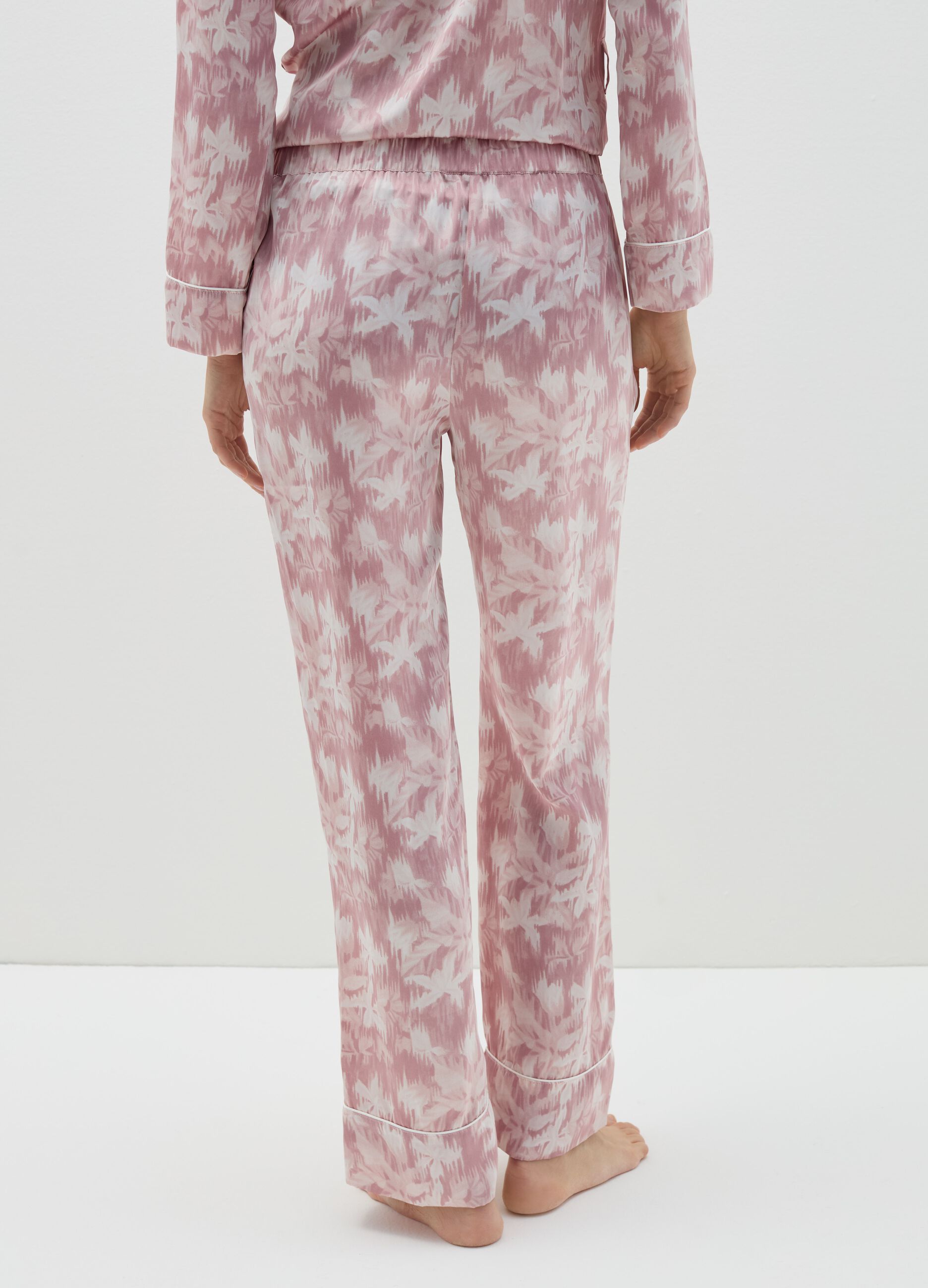 Pantalone pigiama in satin rosa e bianco