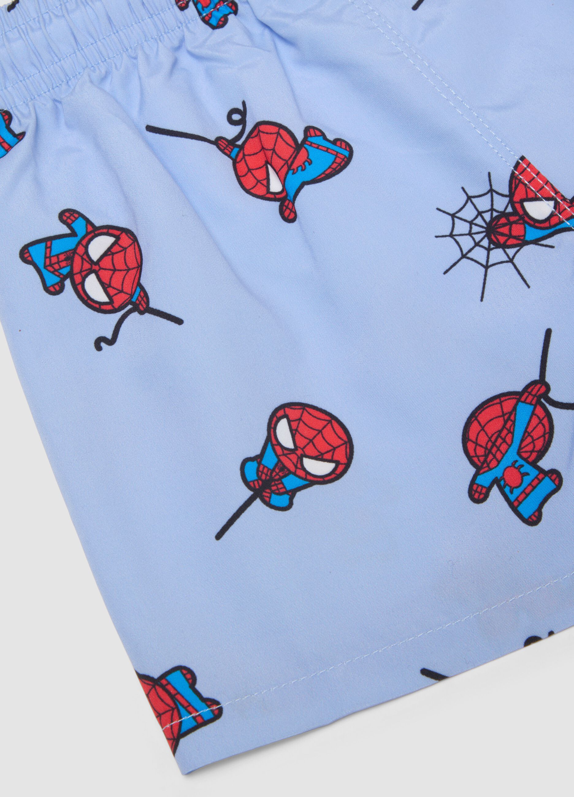 Blue swim shorts with Spidey print