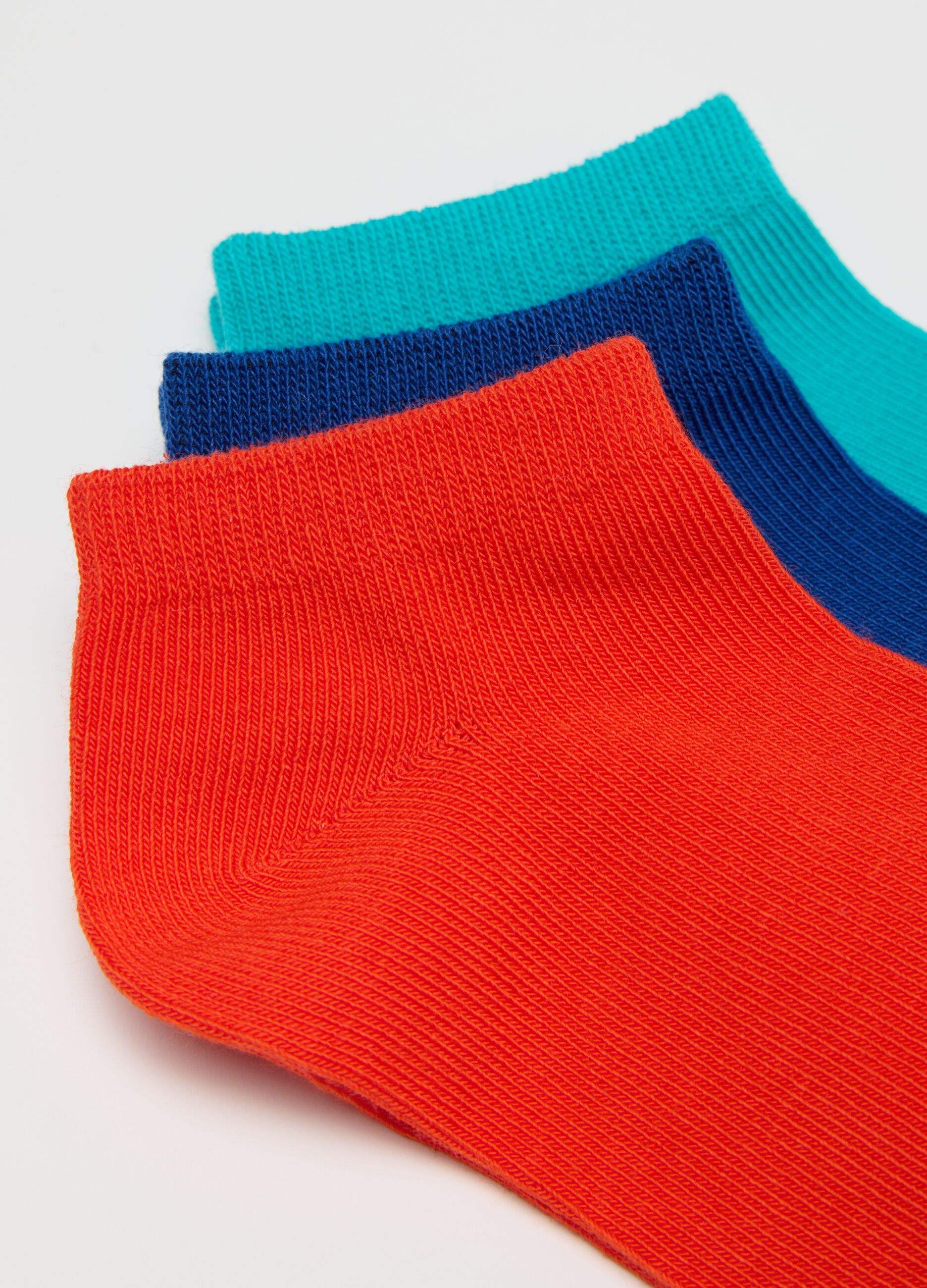 Five-pair pack orange and blue stretch shoe liners