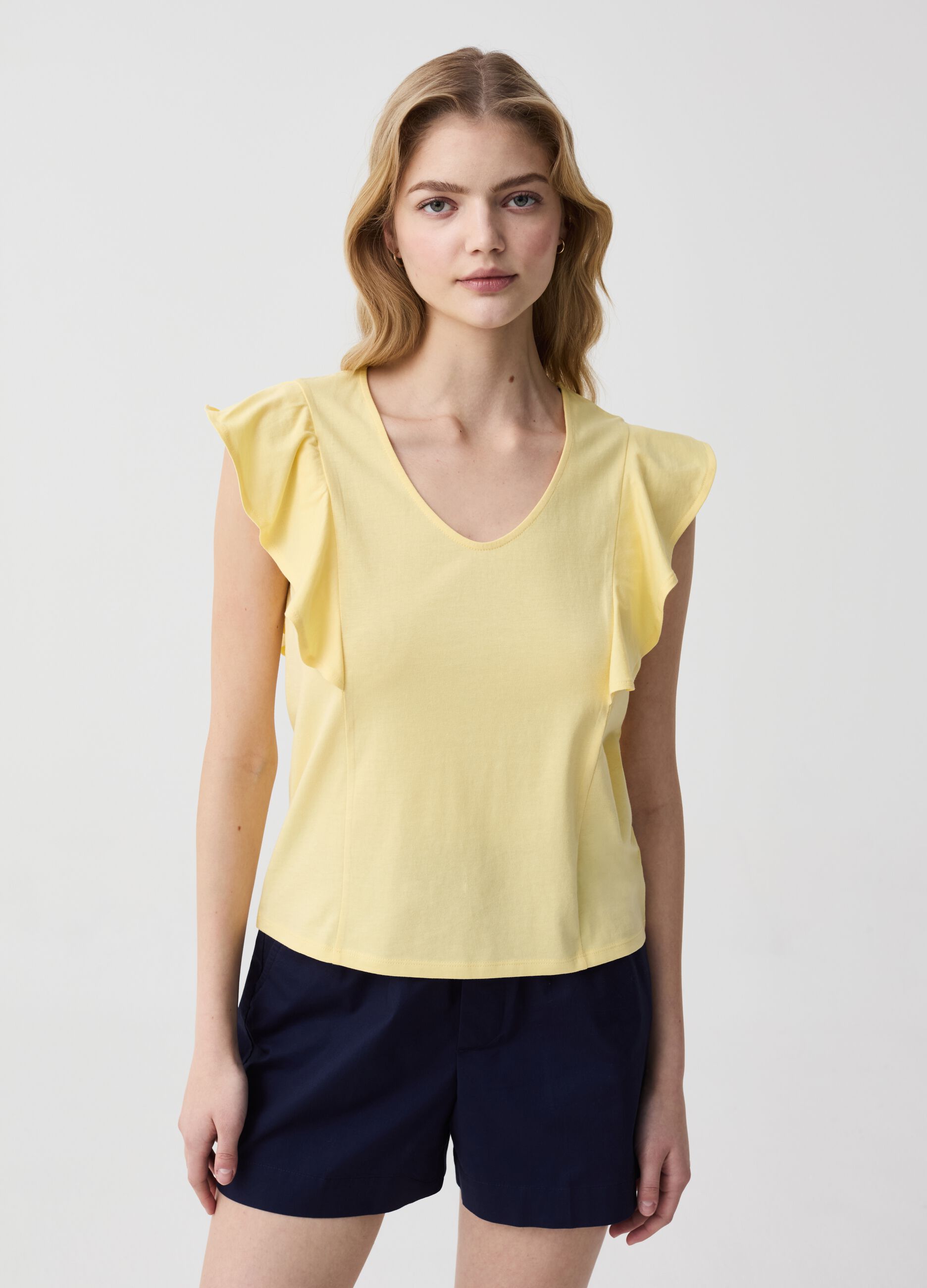 Sleeveless T-shirt with V neck and flounce