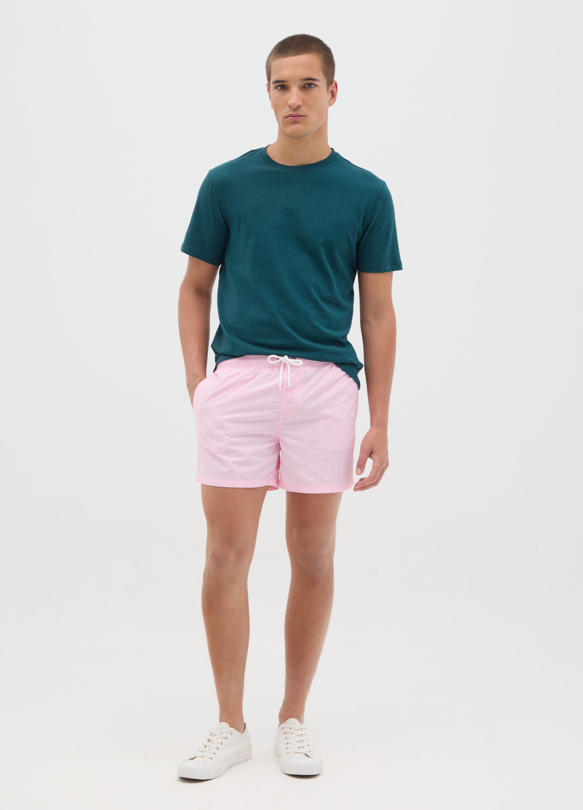 Pink swim trunks in mixed materials