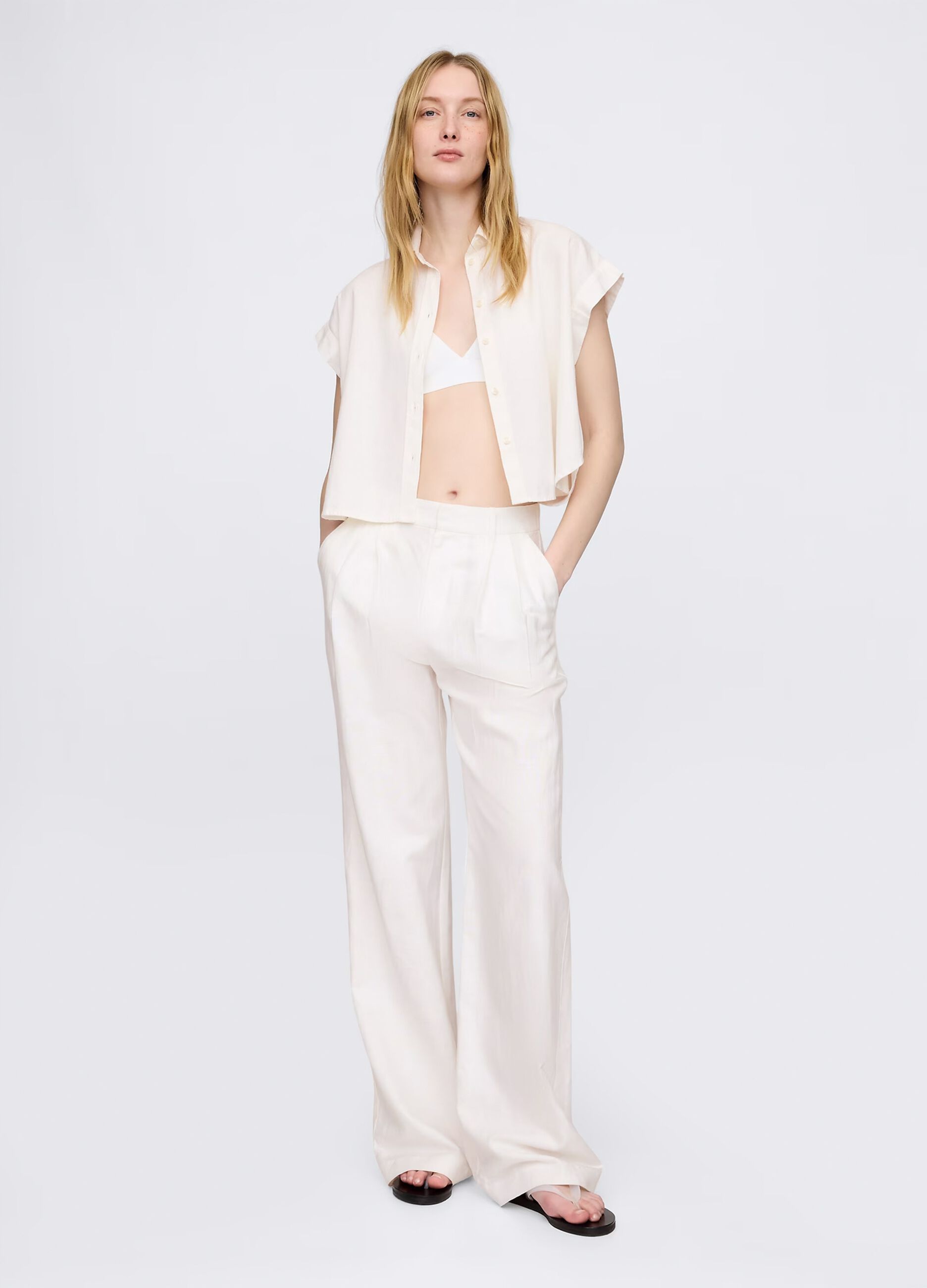 Sleeveless white linen and viscose shirt