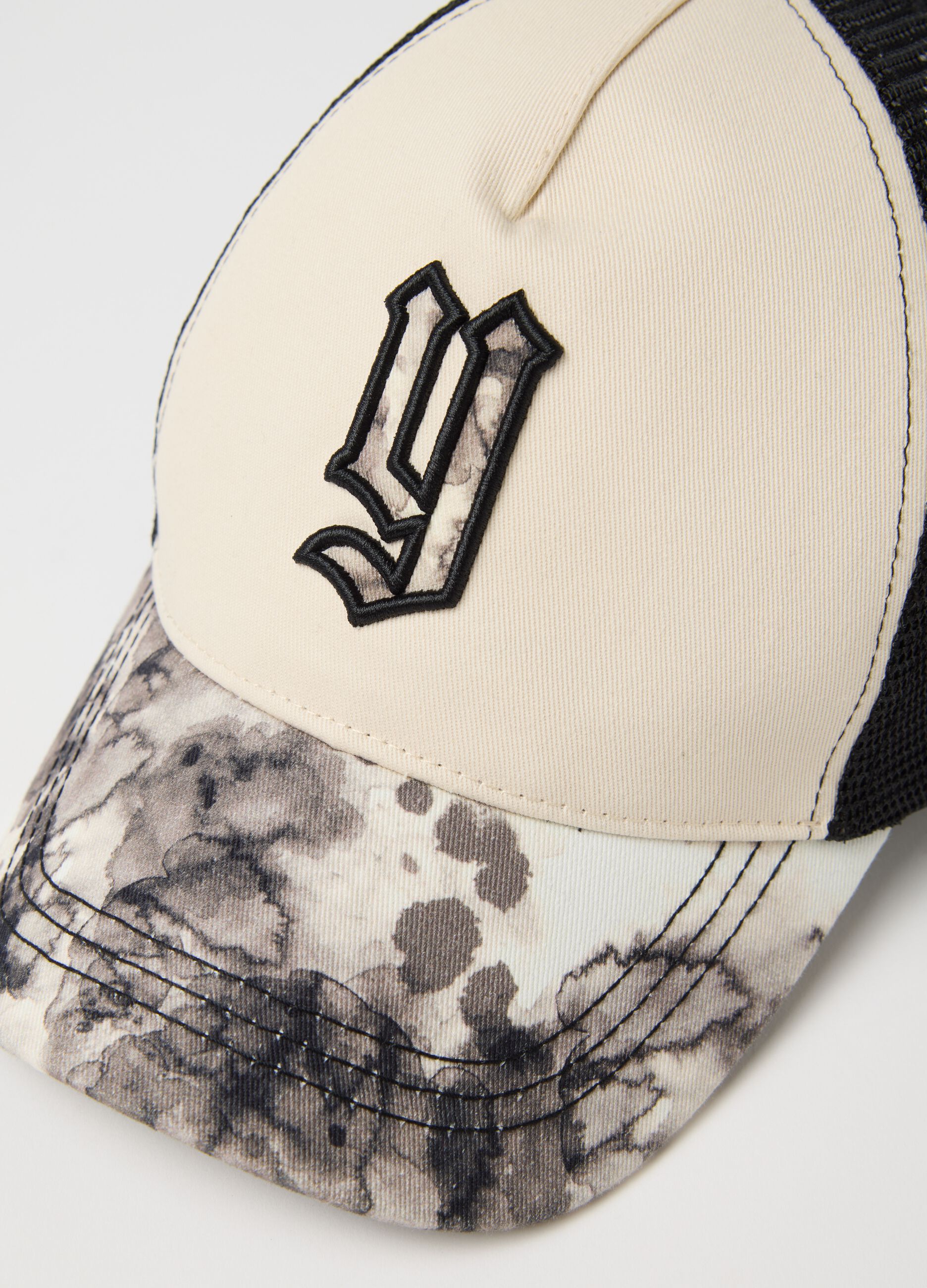 Beige and black cap with back mesh