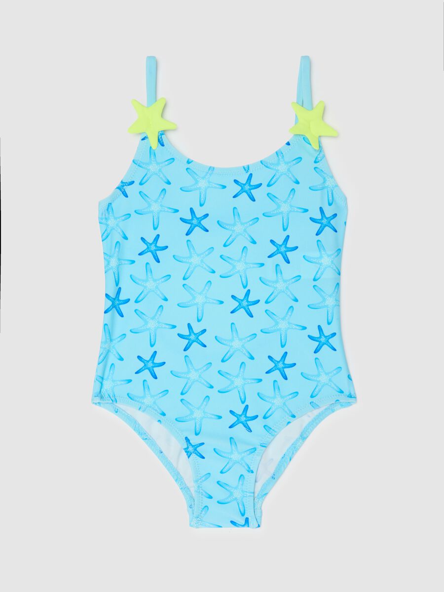 Girls’ one-piece swimsuit in light blue stretch fabric with starfish design_0