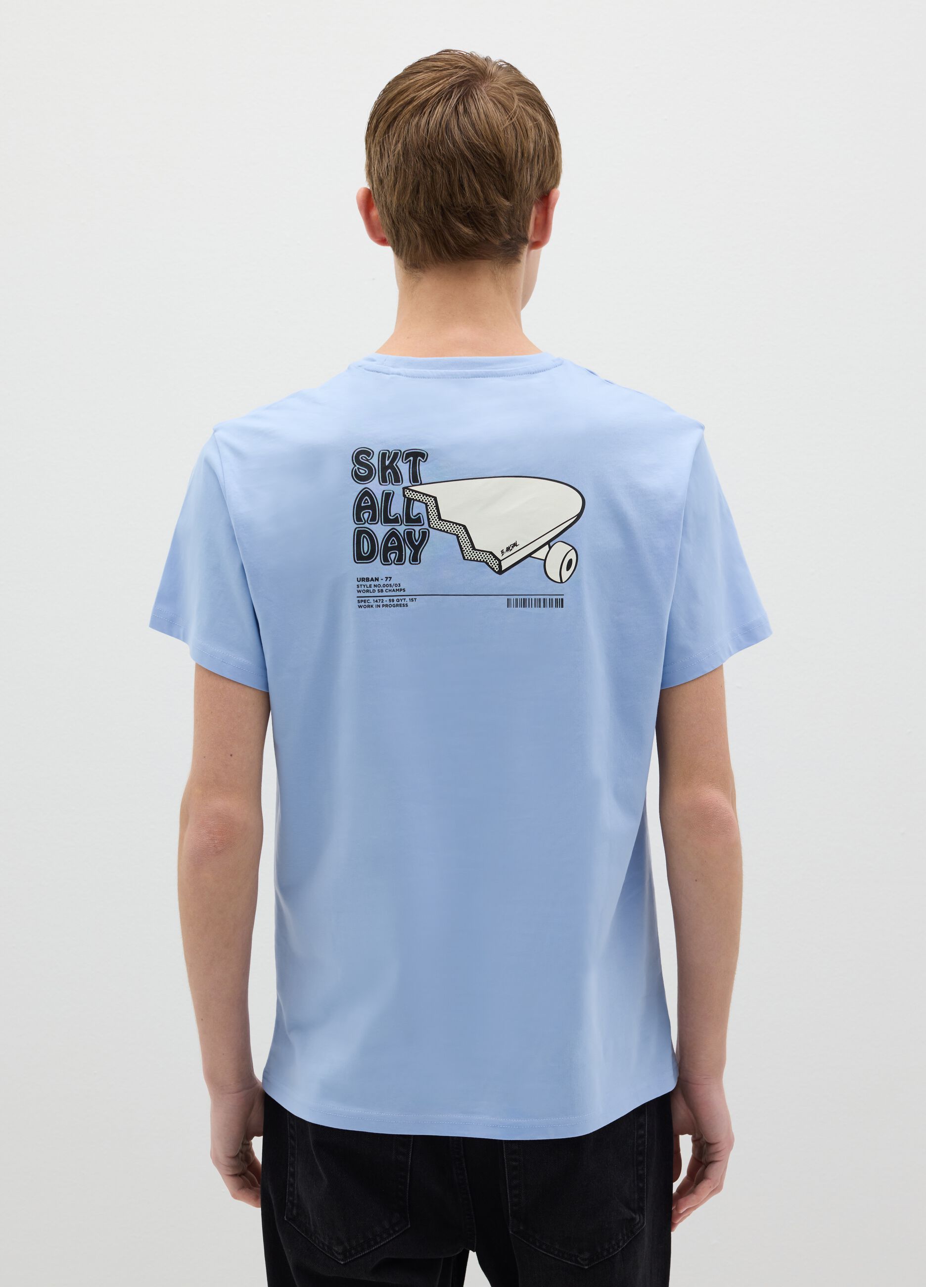 Light blue T-shirt with skateboards print