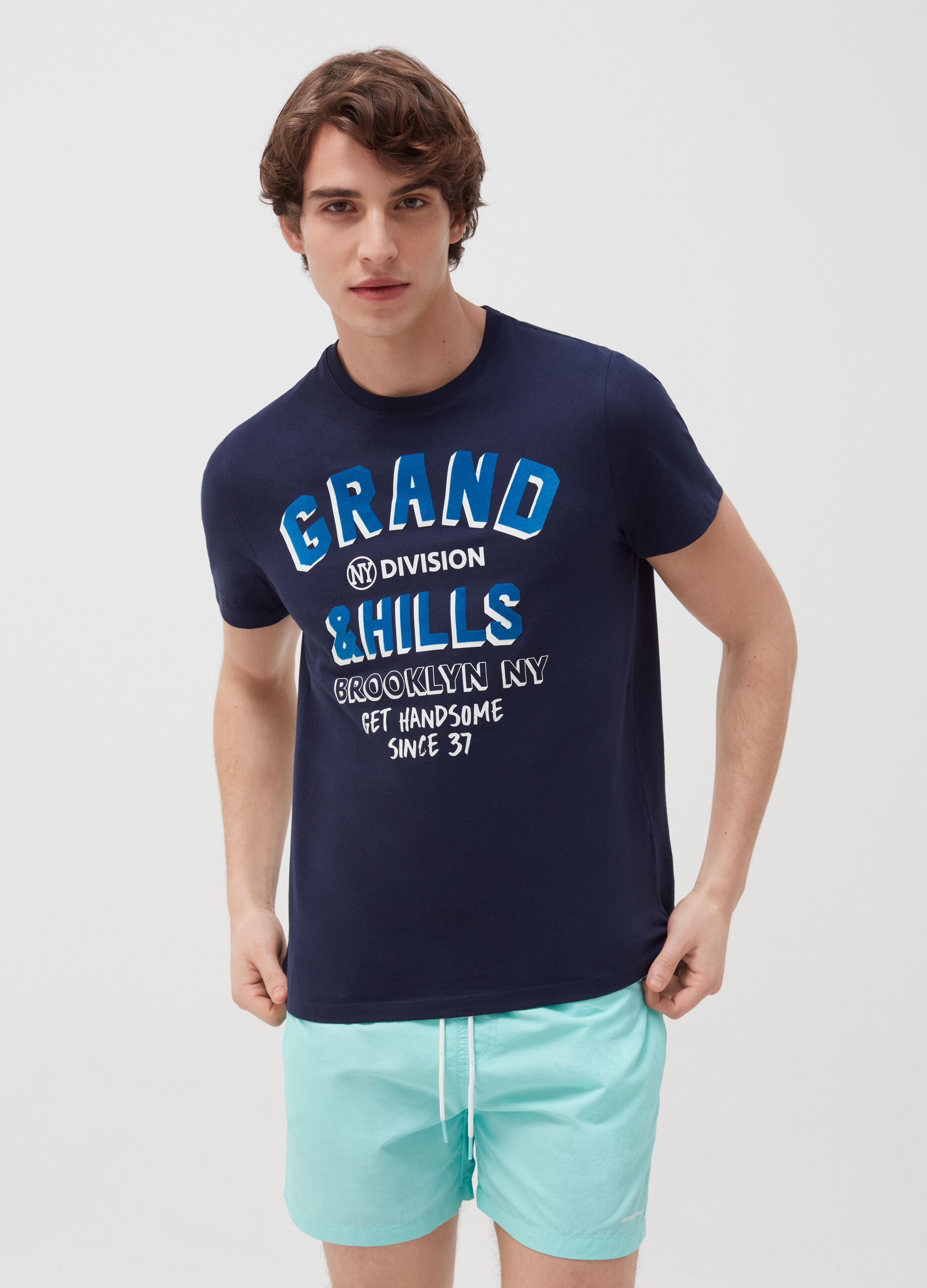 Swimming trunks with lettering print
