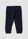 Pantaloni jogger blu in puro cotone con motivo animalier_1