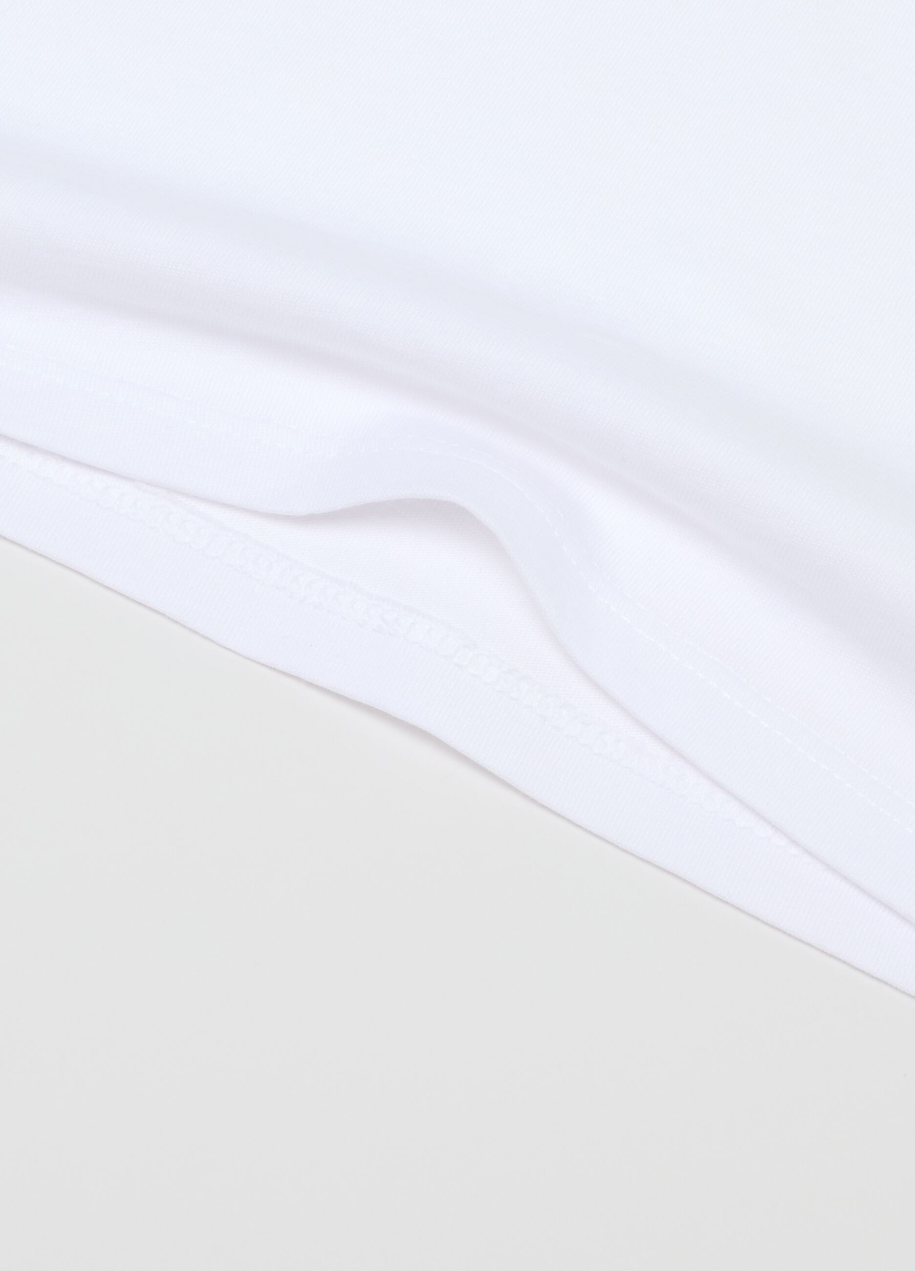 Twin pack of white girls' vests in pure cotton regular fit