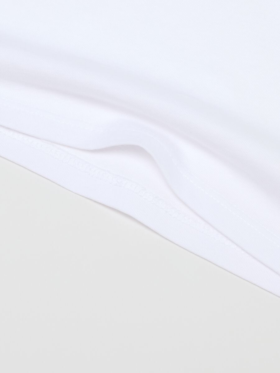 Twin pack of white girls' vests in pure cotton regular fit_2