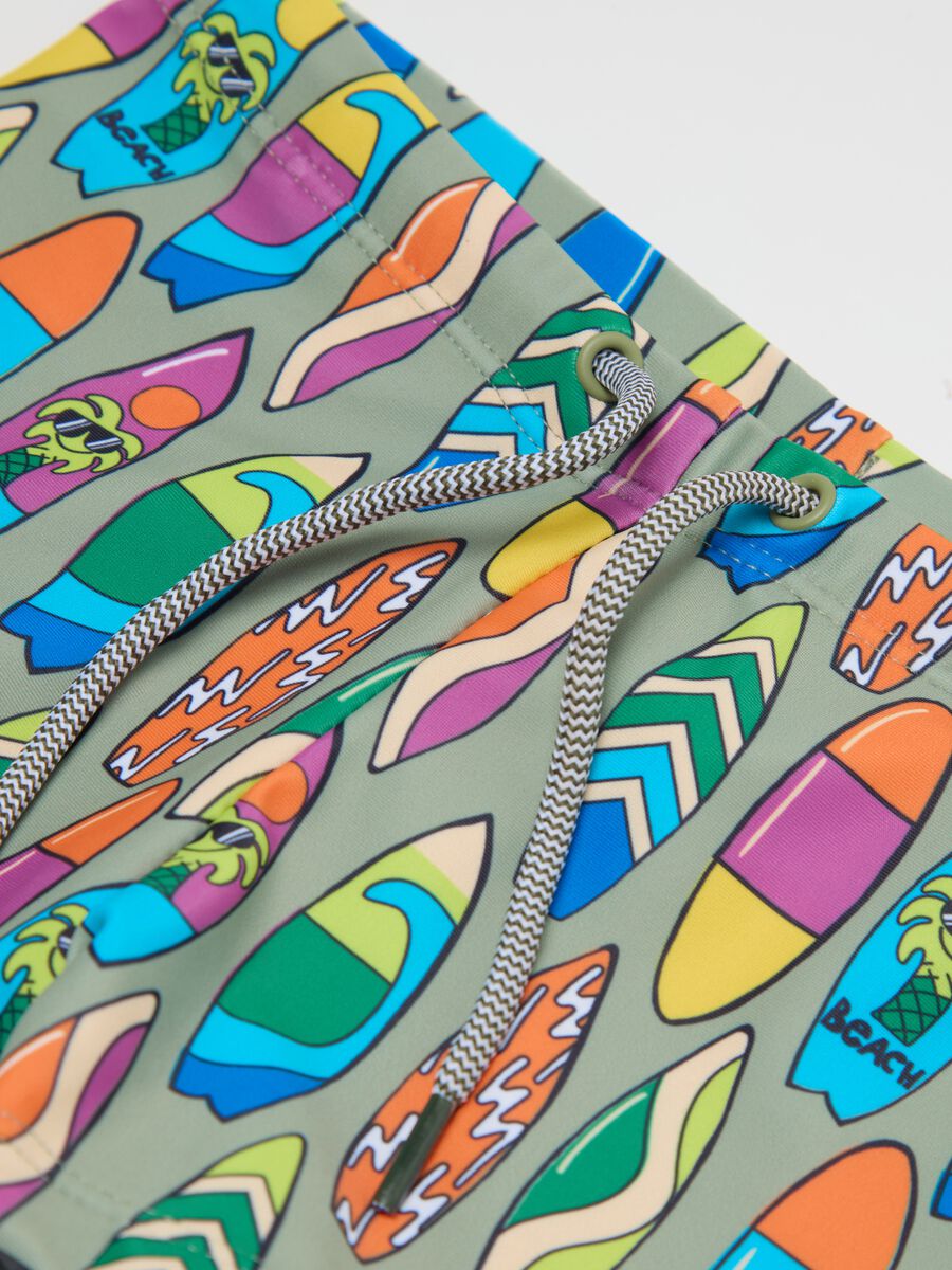 Boys’ swim briefs in multicoloured stretch fabric with print_2