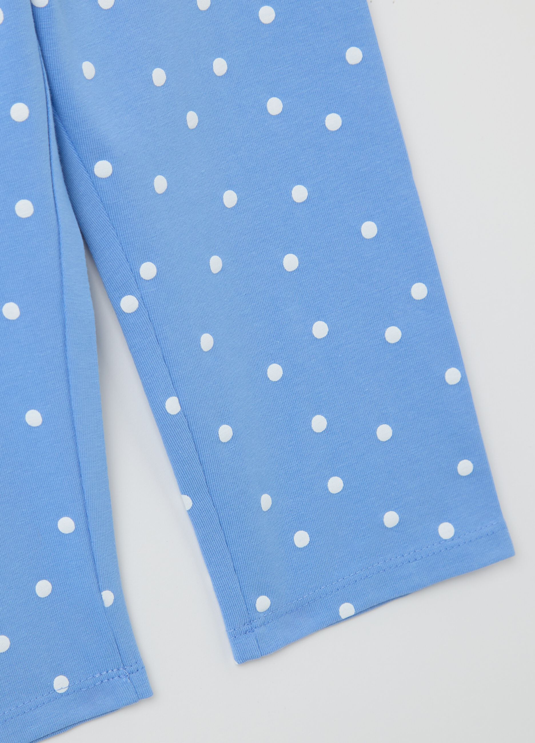 Light blue three-quarter leggings with polka dot pattern