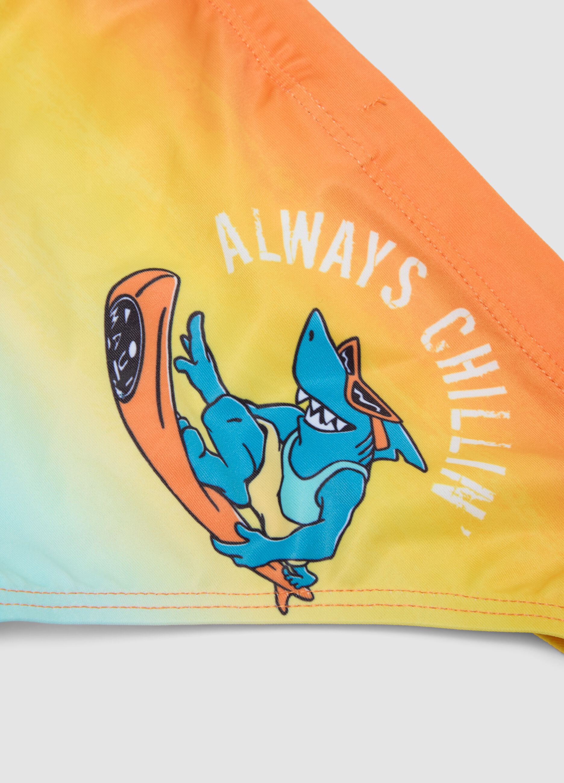 Slip mare arancione e azzurro in tessuto elasticizzato da bambino