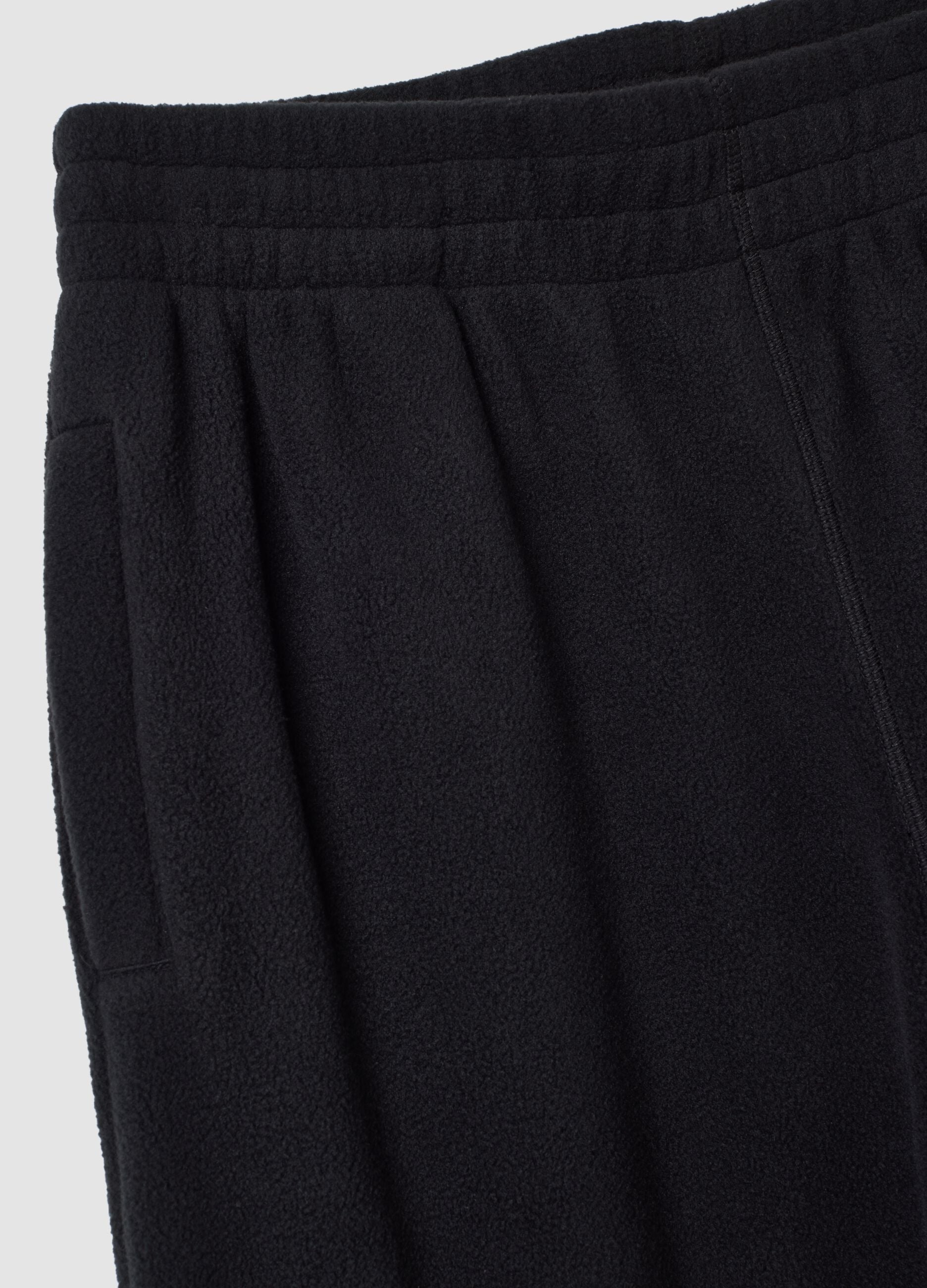 Black regular-fit fleece joggers with elasticated waistband
