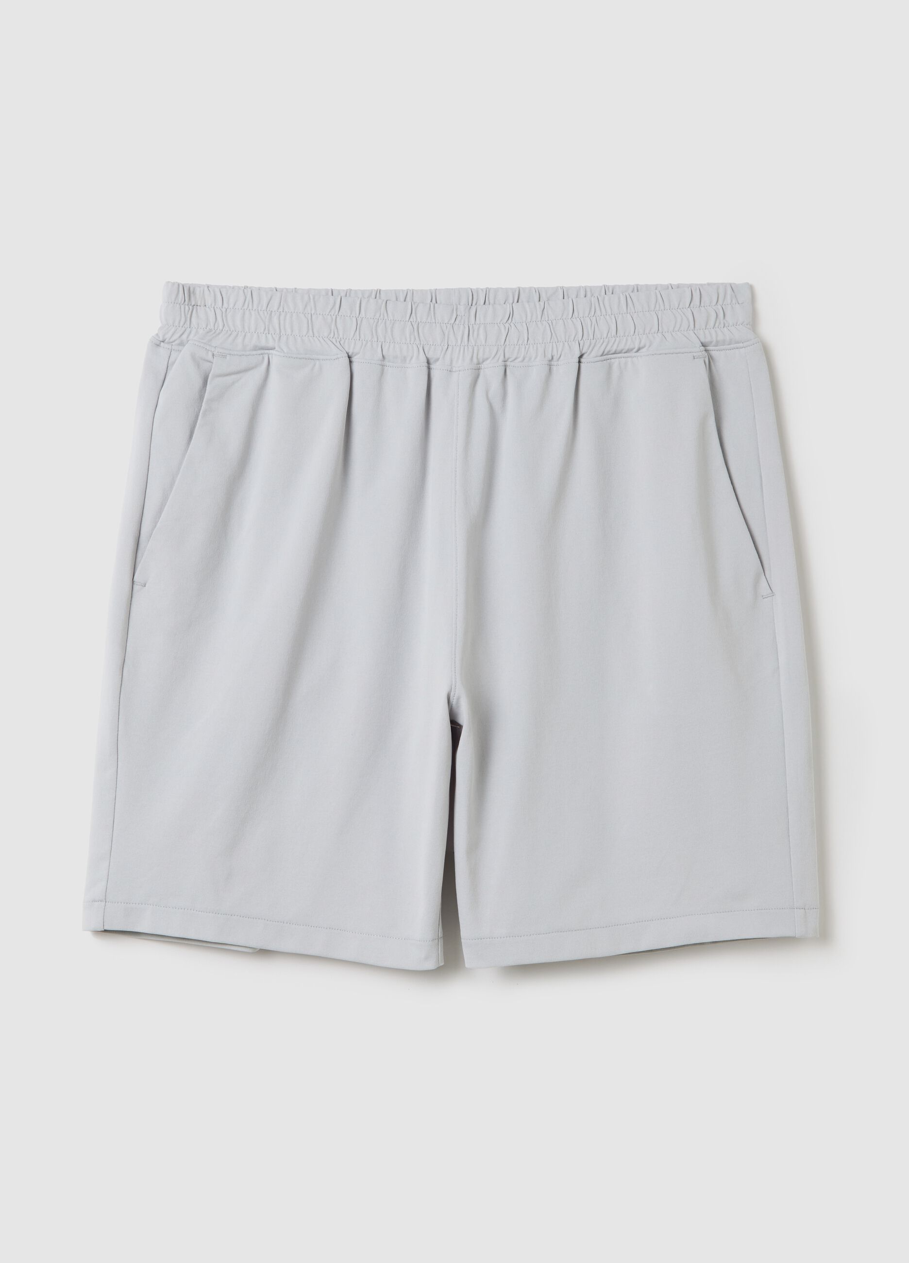 Grey Bermuda joggers in stretch fabric