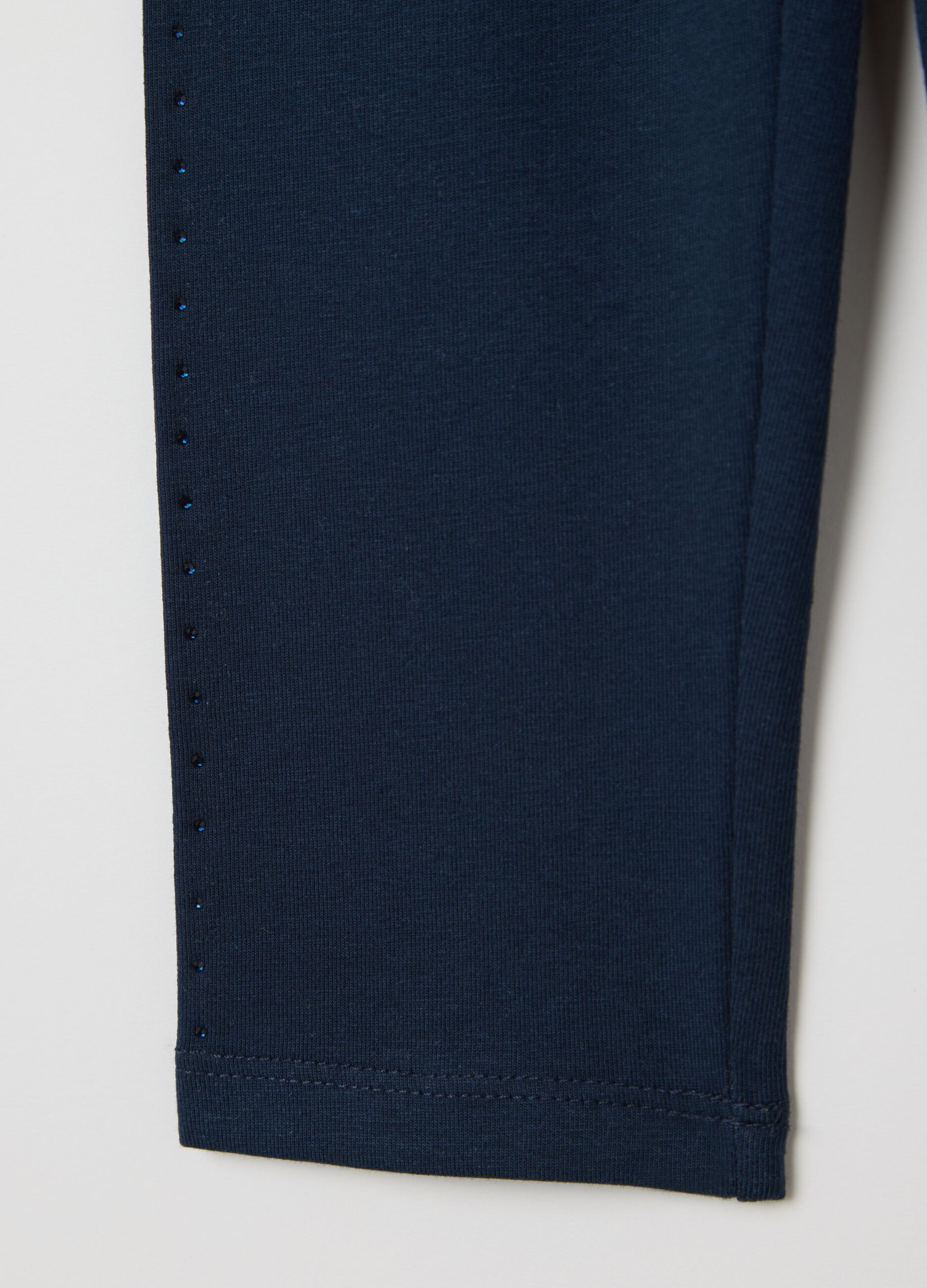 Blue three-quarter leggings in stretch cotton with diamantés