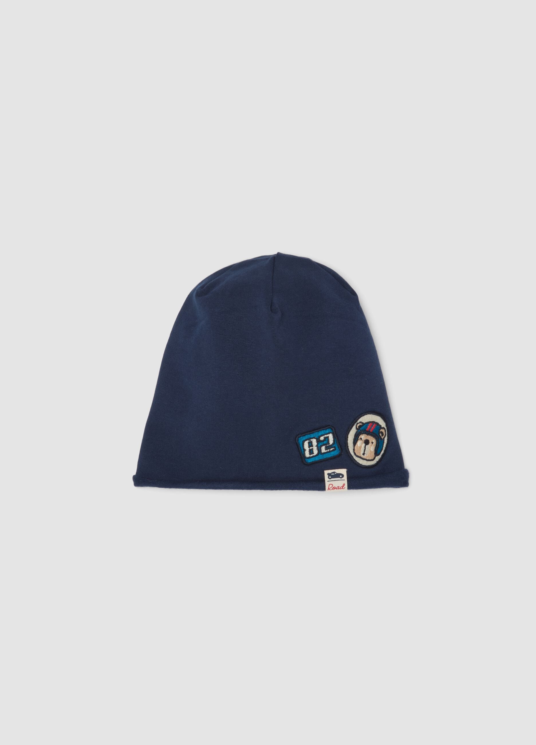 Blue organic stretch cotton jersey hat with appliqu&eacute;s