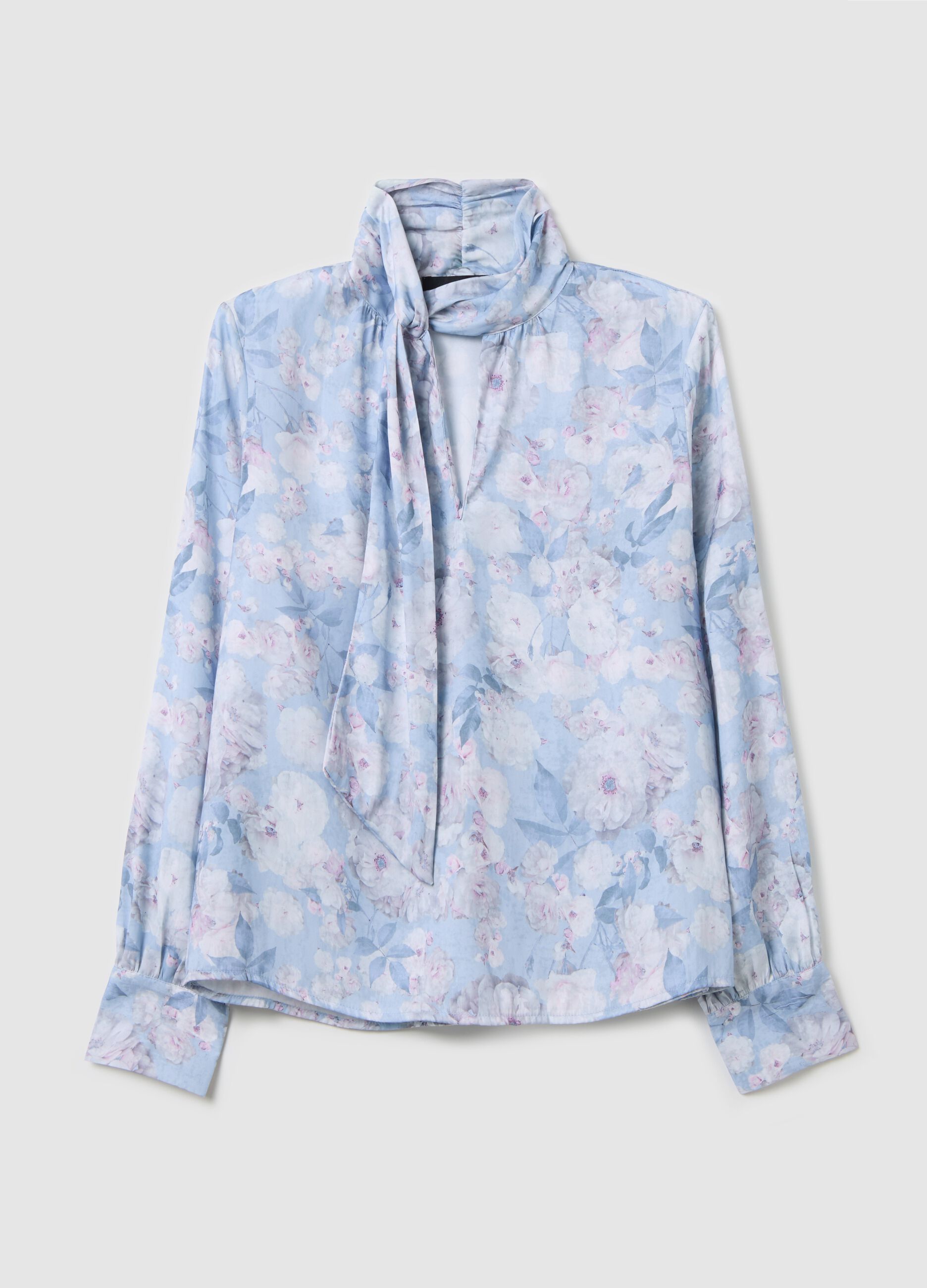 Light blue blouse with floral pattern and bow